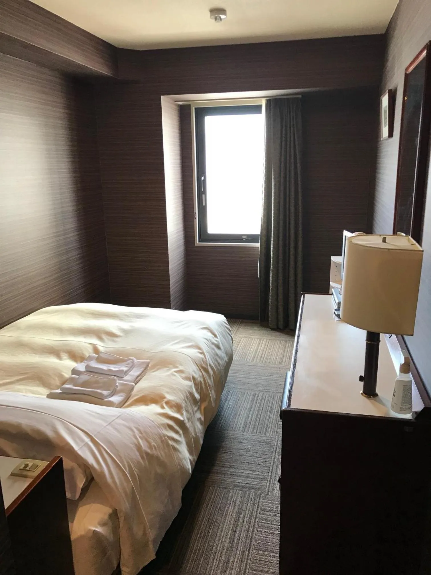 Photo of the whole room, Bed in Hotel Crown Hills Nakamura