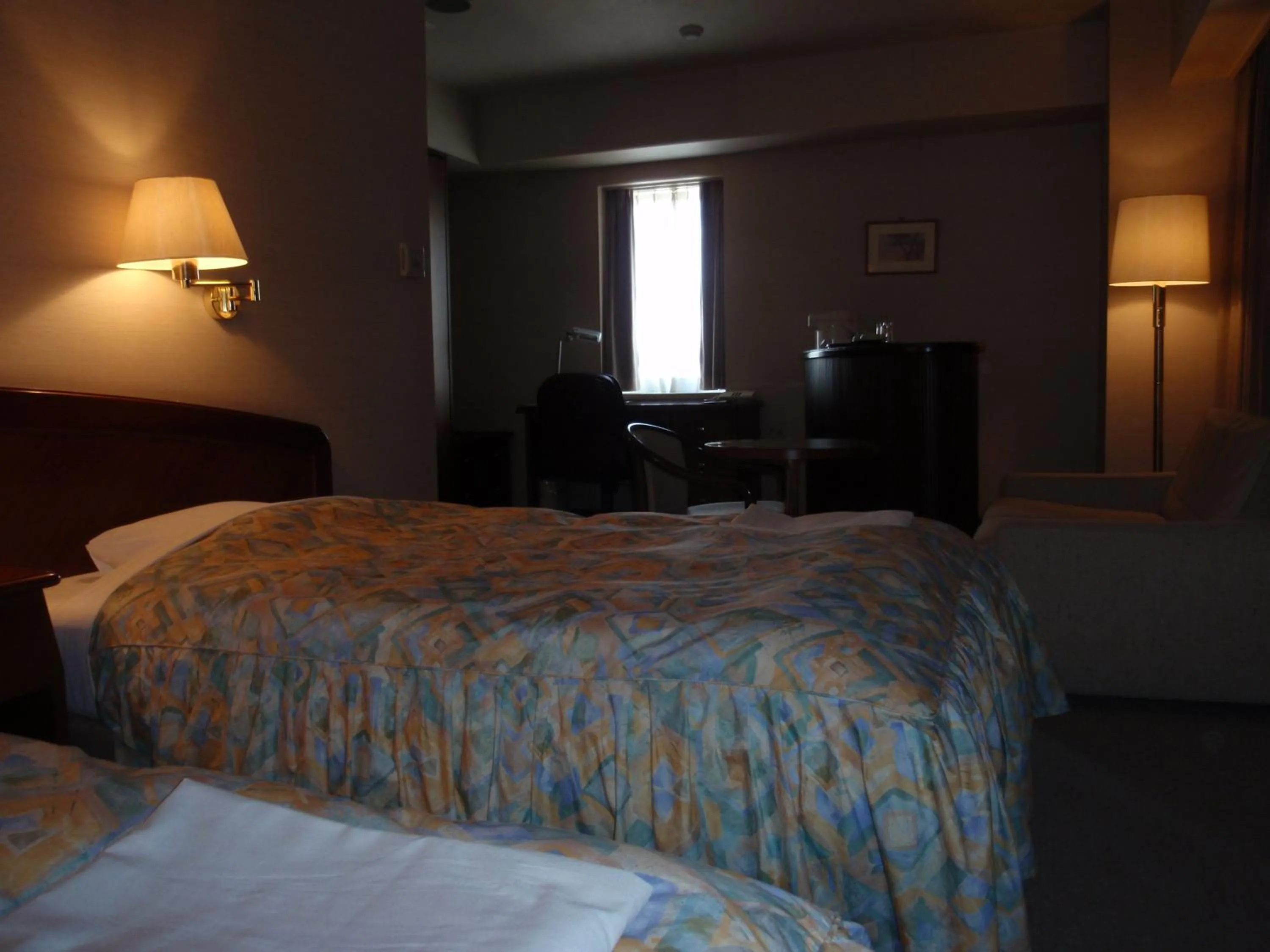 Photo of the whole room, Bed in Hotel Crown Hills Okaya