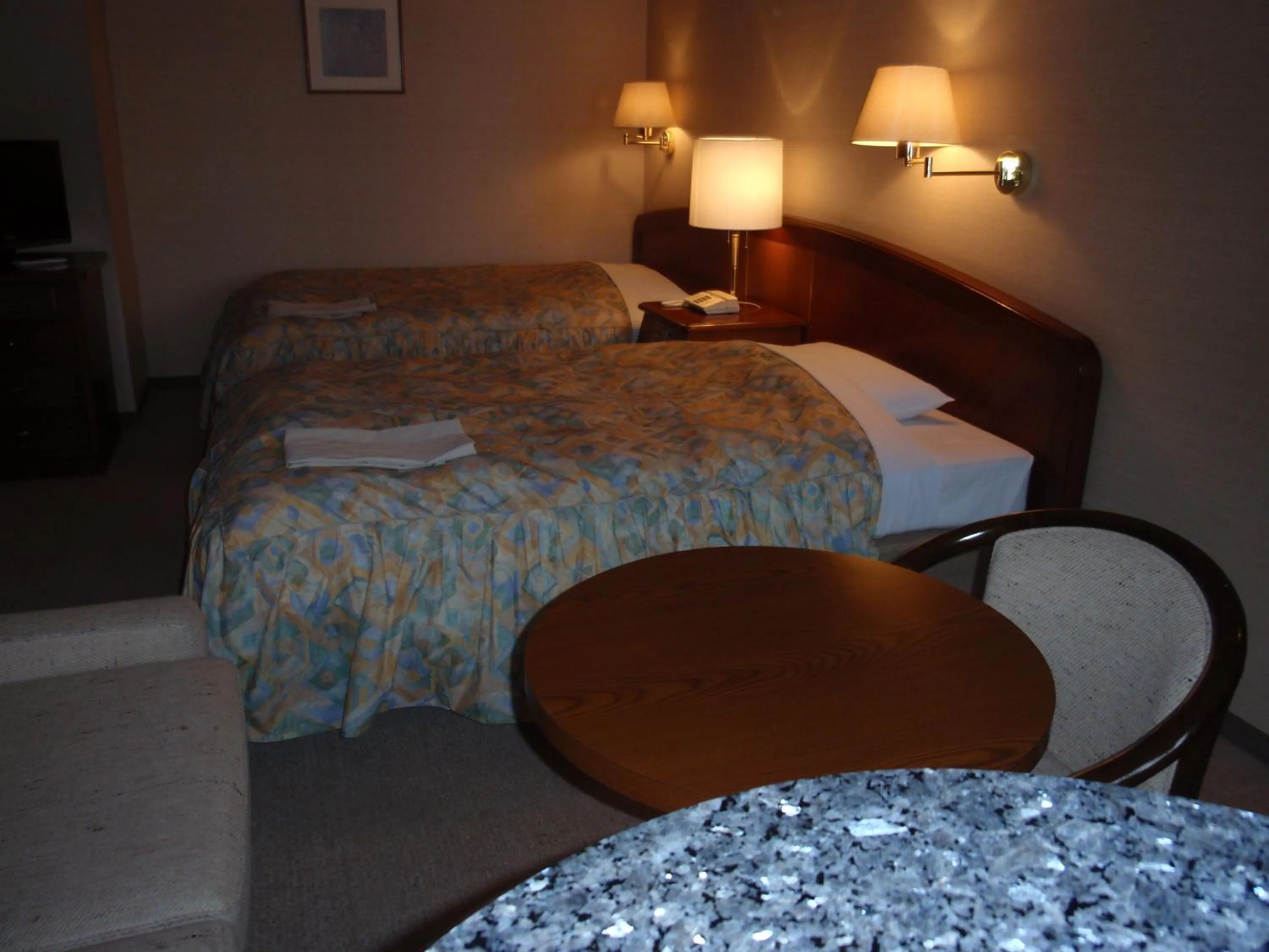 Photo of the whole room, Bed in Hotel Crown Hills Okaya