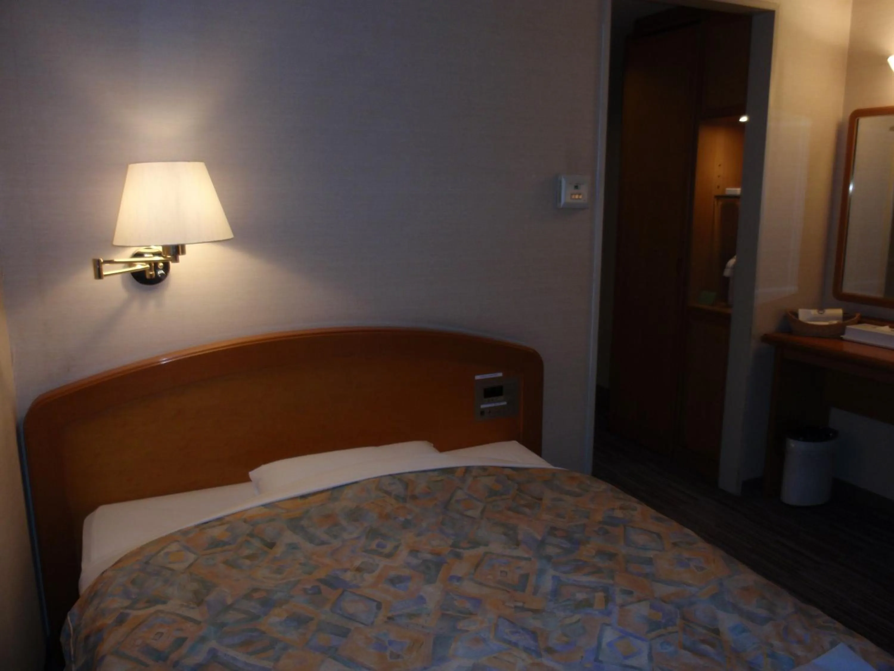 Photo of the whole room, Bed in Hotel Crown Hills Okaya