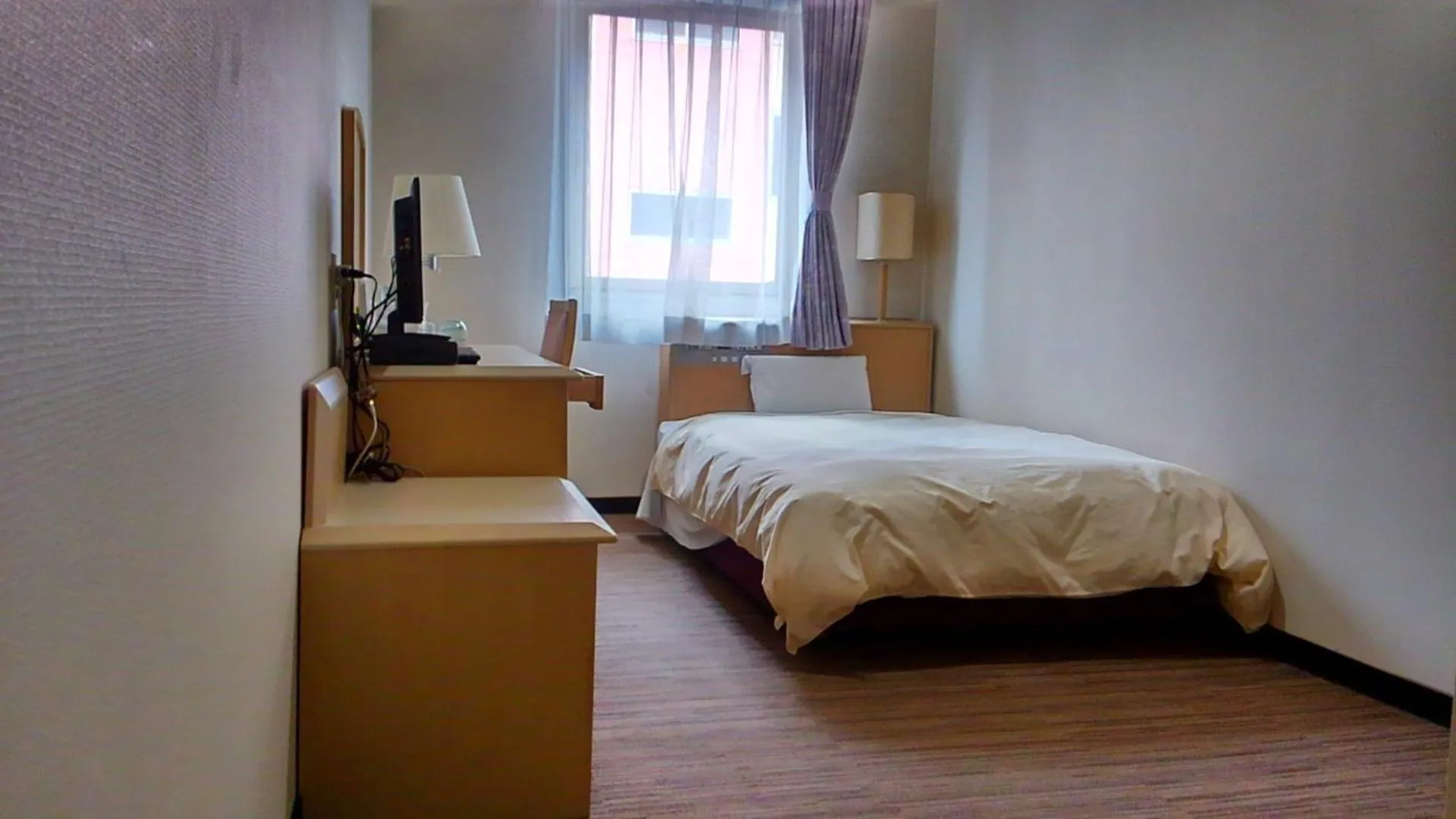 Bed in Hotel Hitachi Hills