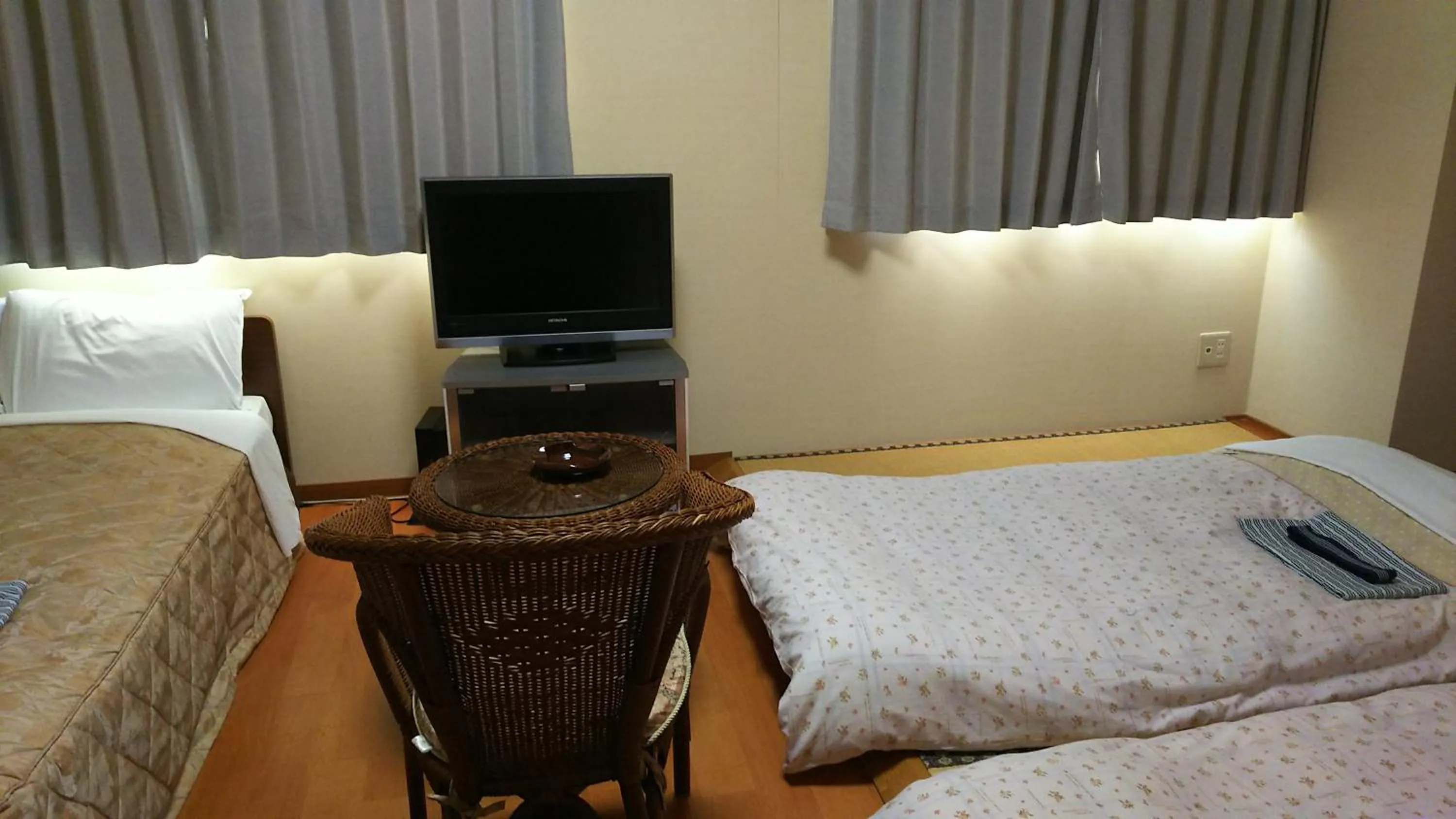 Photo of the whole room, Bed in New Central Hotel Katsuta