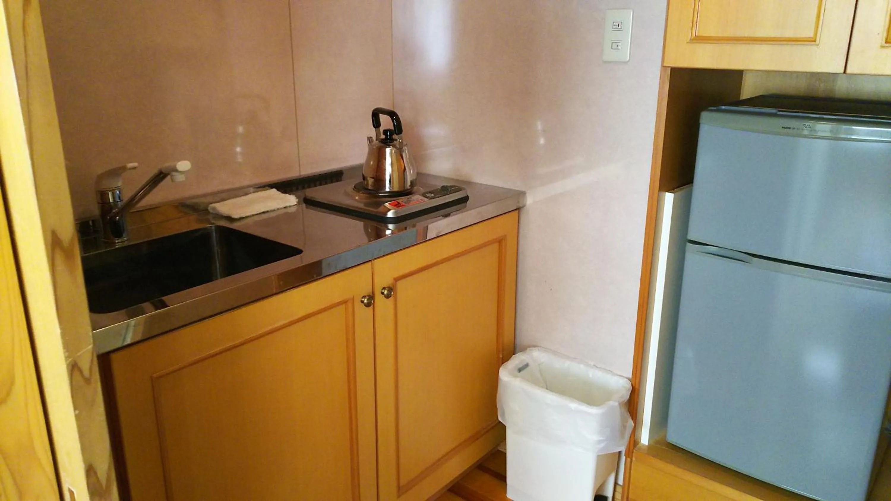 Kitchen or kitchenette in New Central Hotel Katsuta