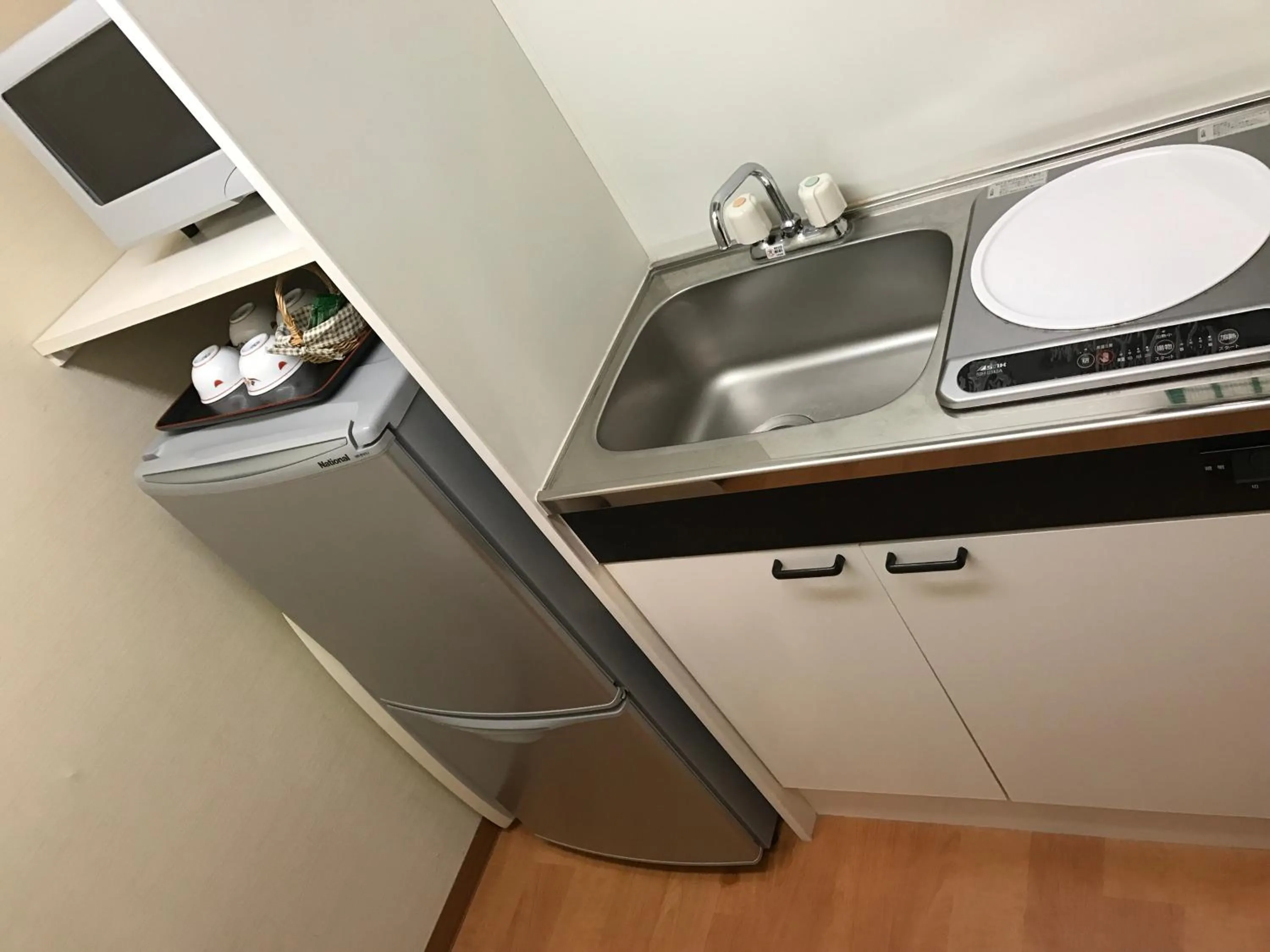 Kitchen or kitchenette in New Central Hotel Katsuta
