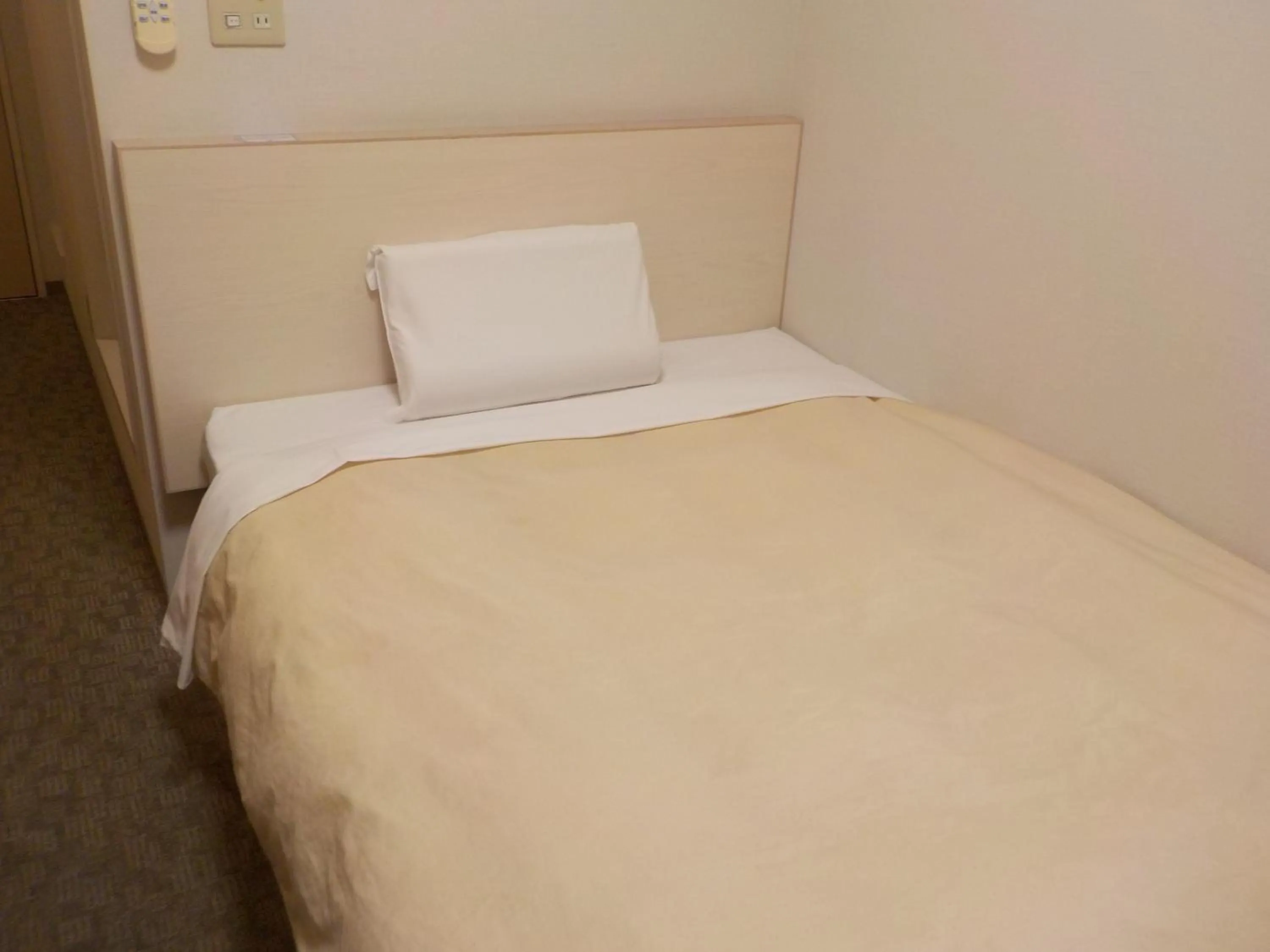 Bed in Hotel Crown Hills Katsuta Omotechoten