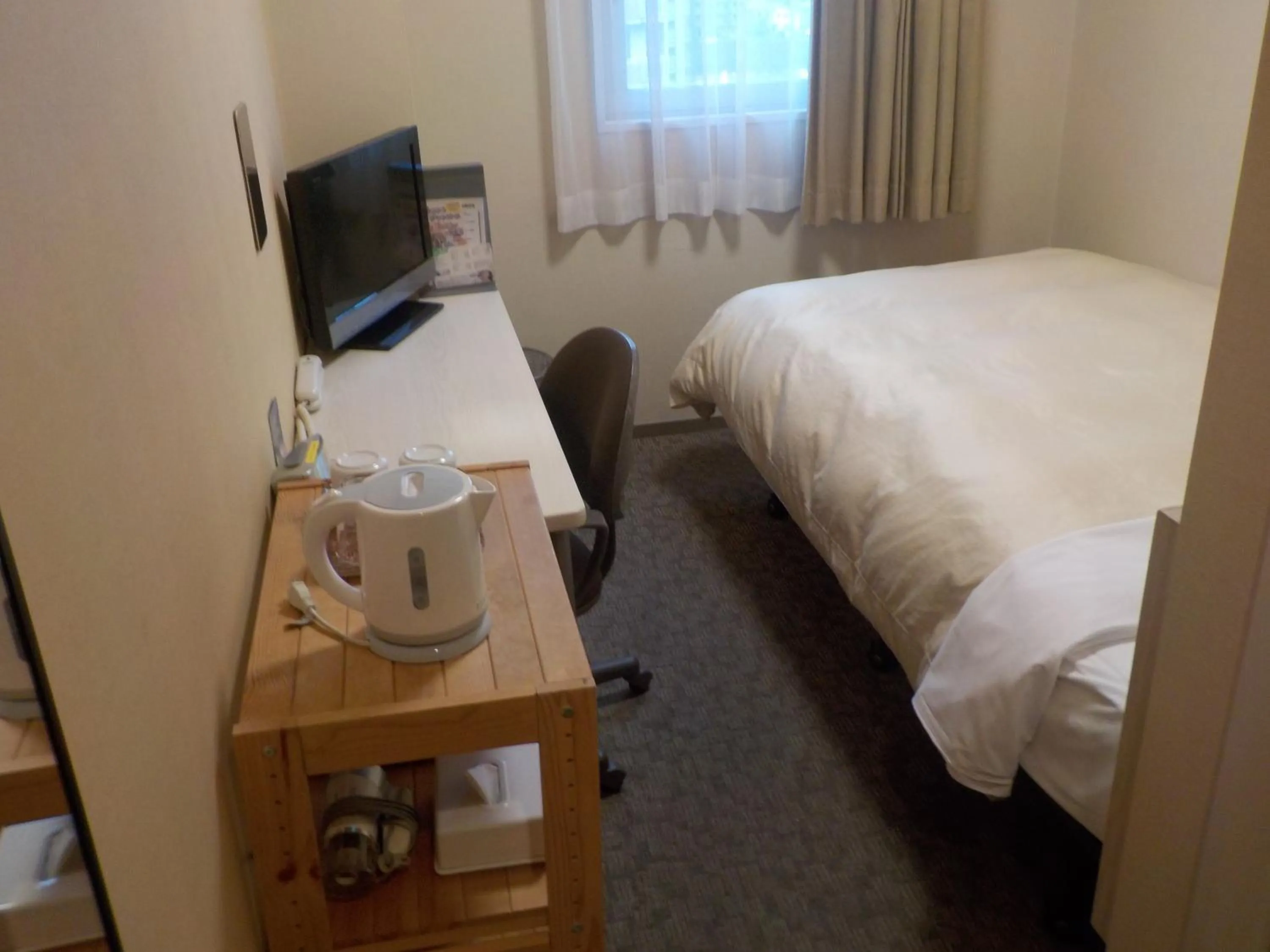 Photo of the whole room, Bed in Hotel Crown Hills Katsuta Omotechoten