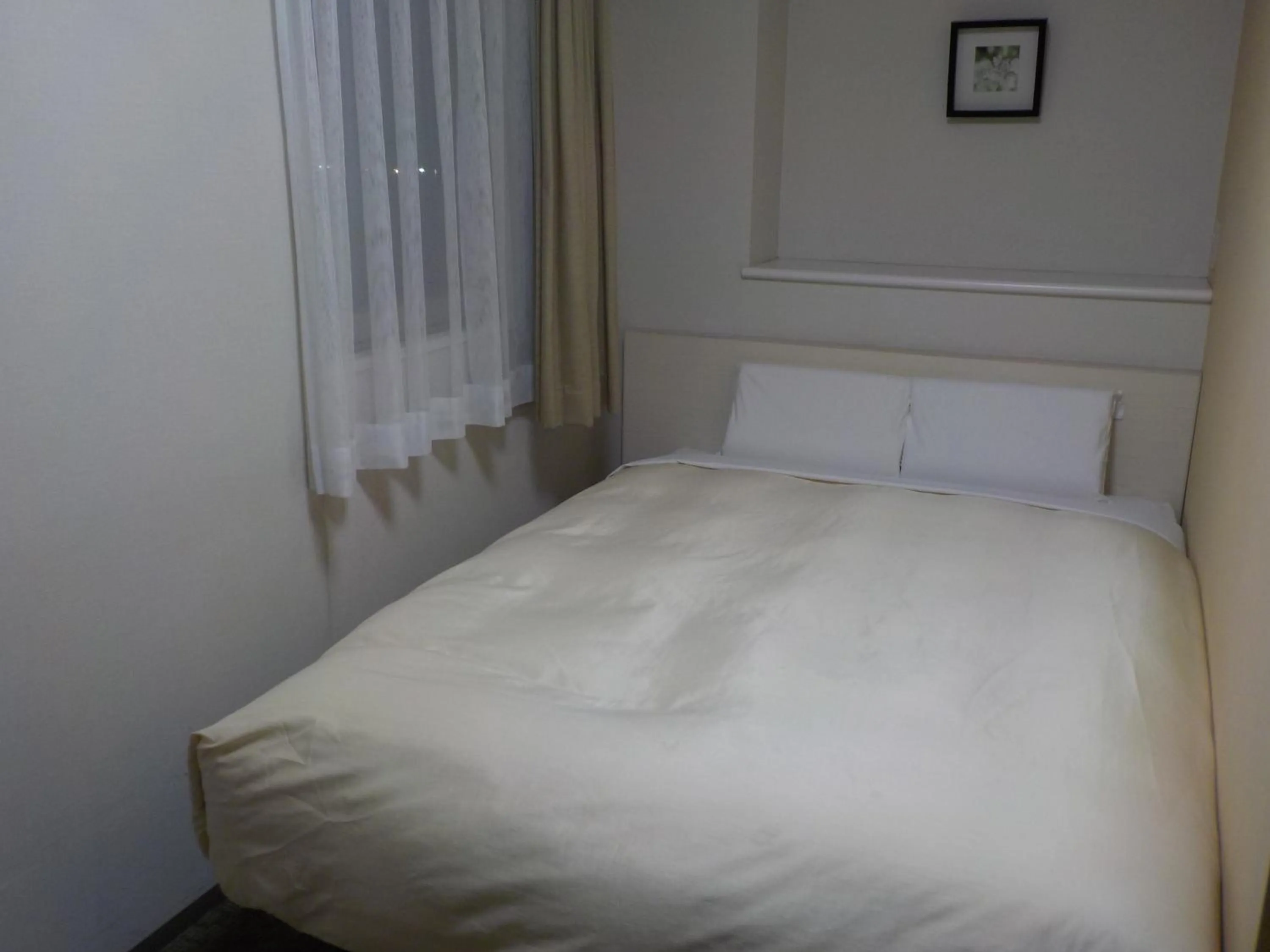 Bed in Hotel Crown Hills Katsuta Omotechoten