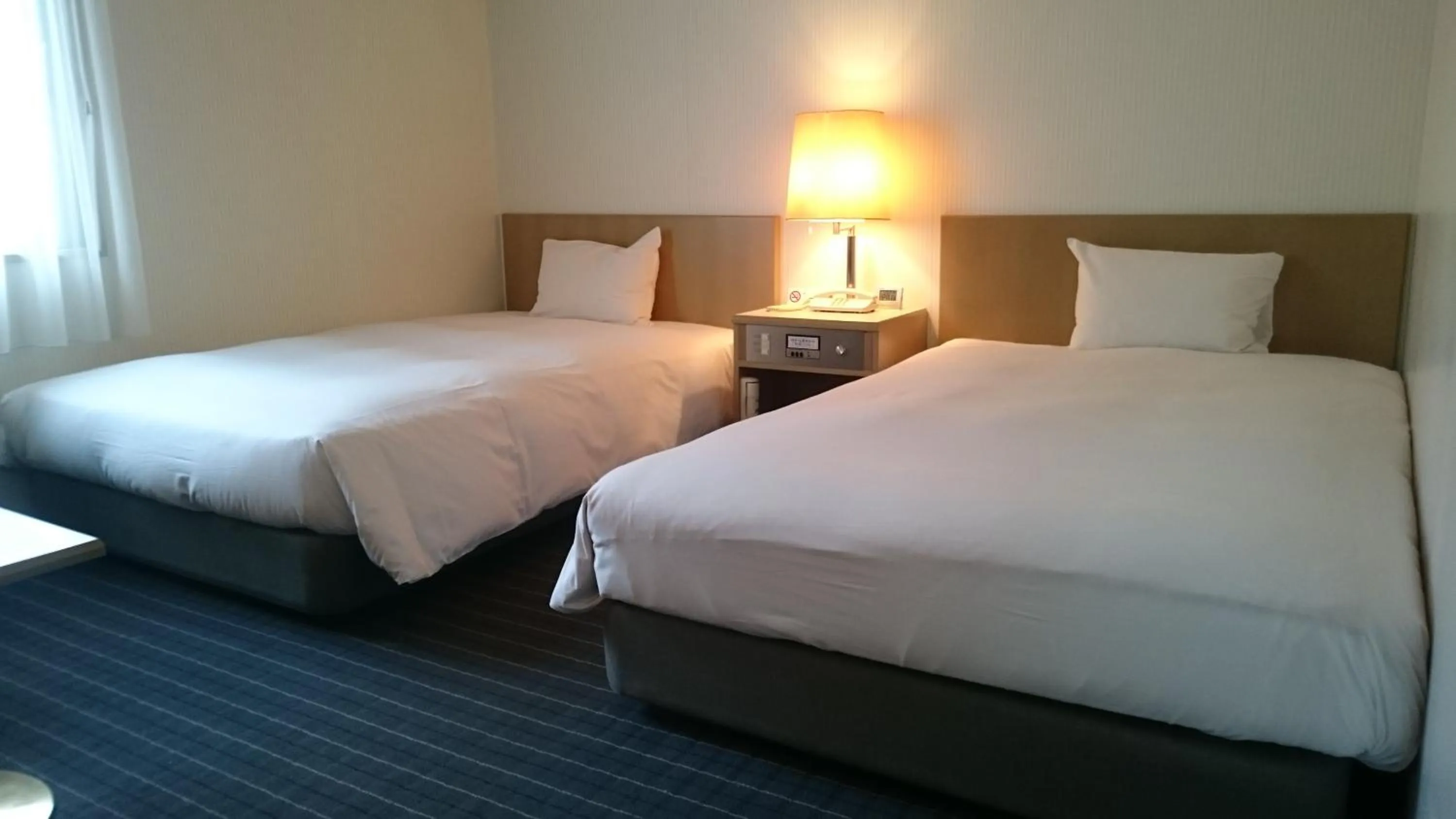Bed in Hotel Crown Hills Sagamihara