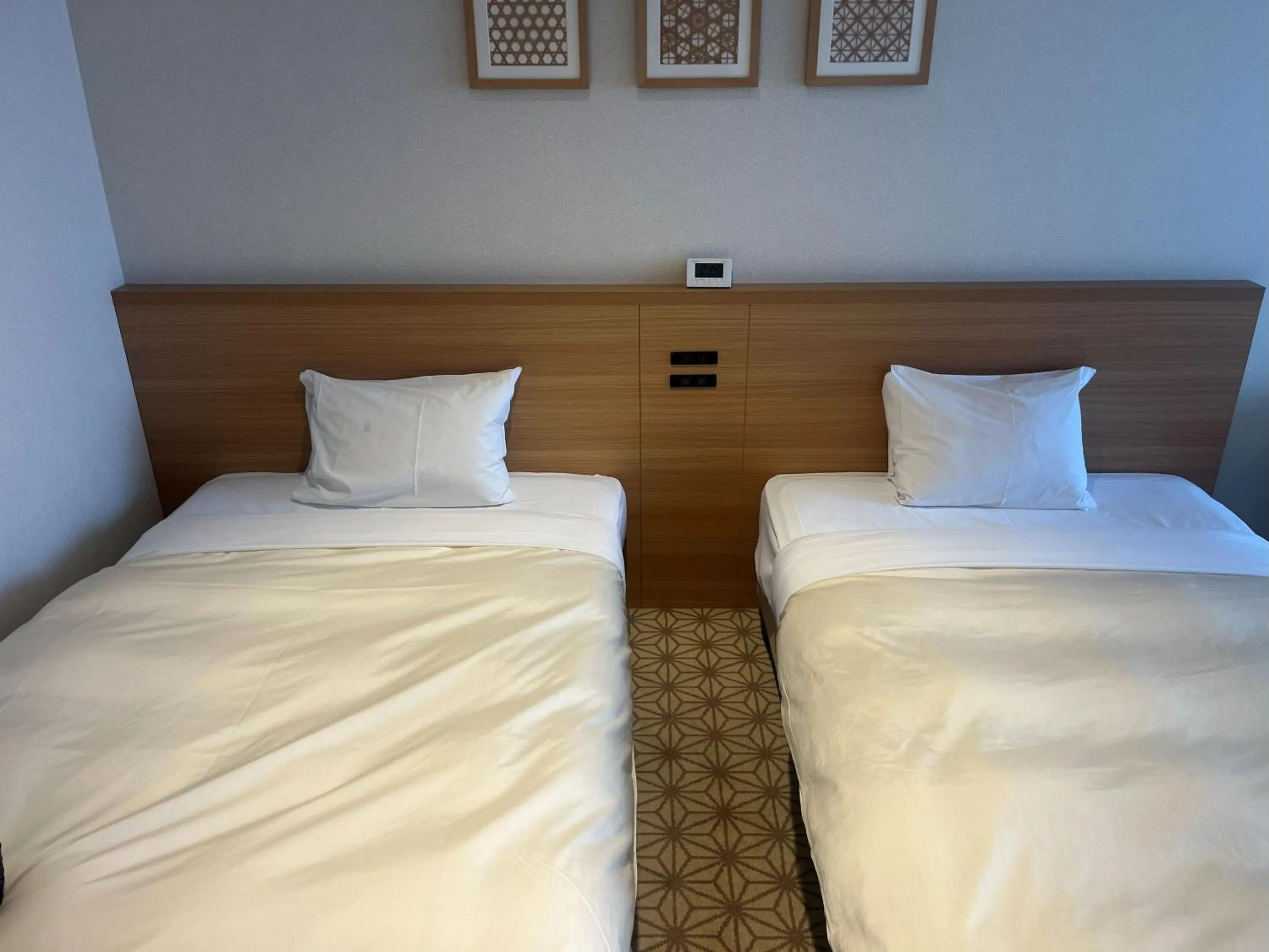 Bed in Hotel Kadoman