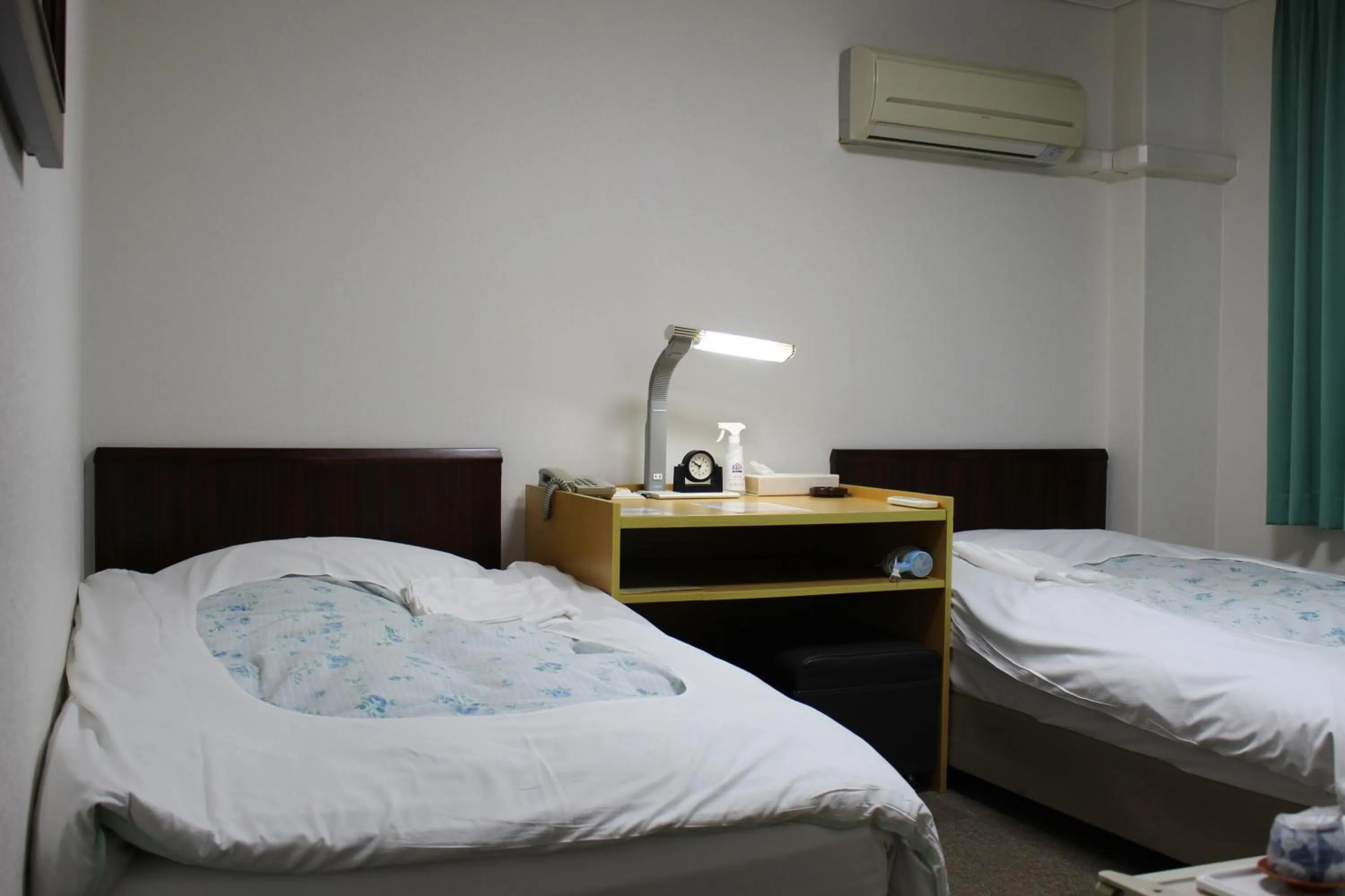 Bed in Hotel Higashihiroshima Hills Saijo