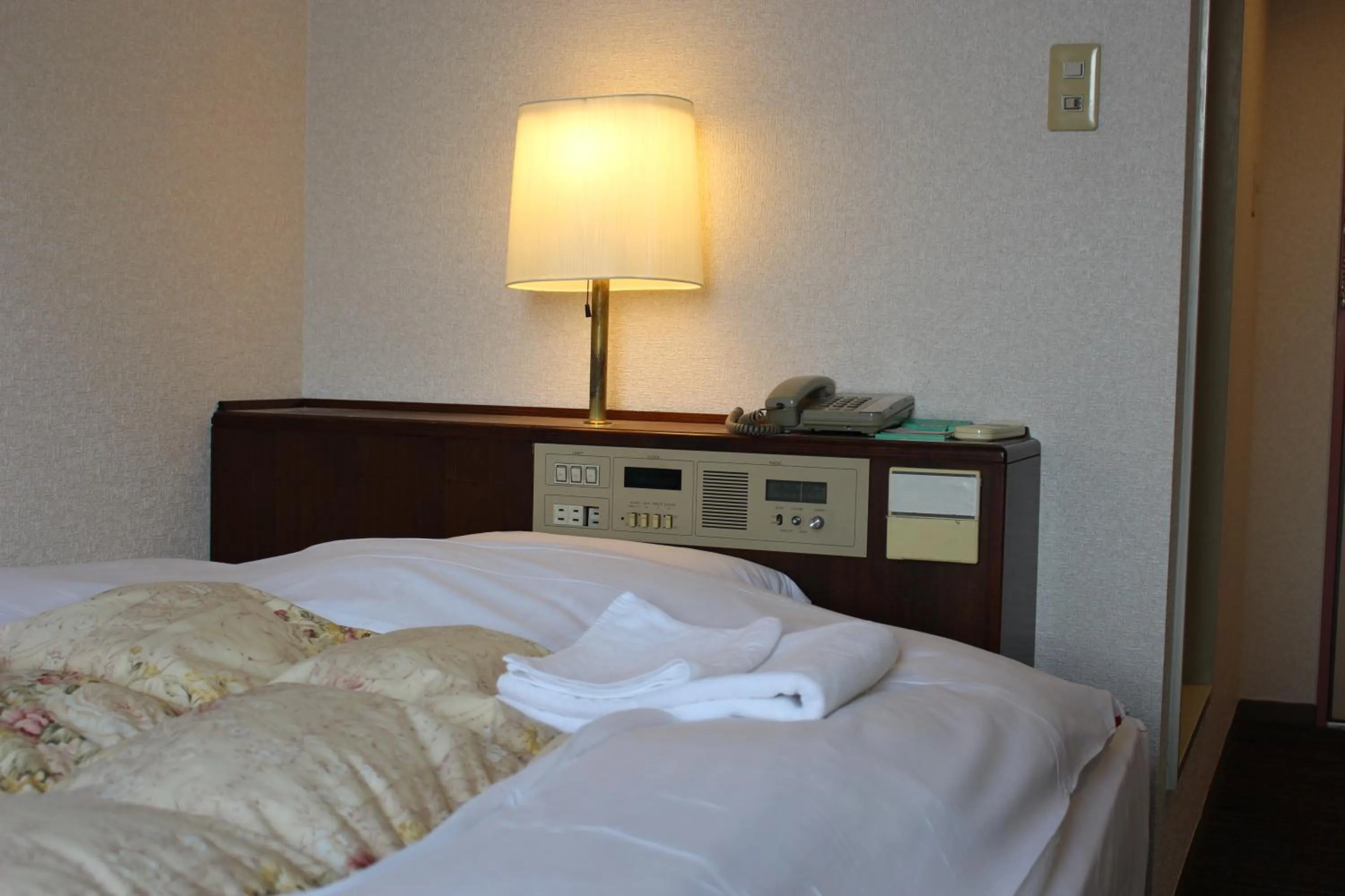 Bed in Hotel Higashihiroshima Hills Saijo