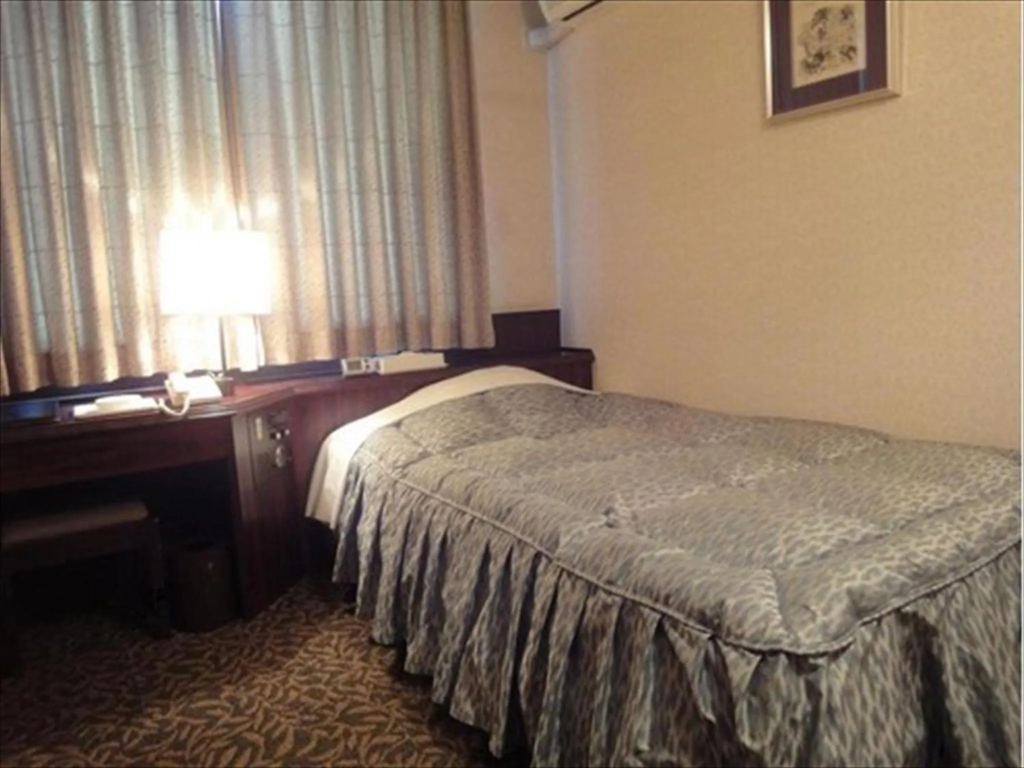 Bed in Hotel CROWN HILLS MIYOSHI