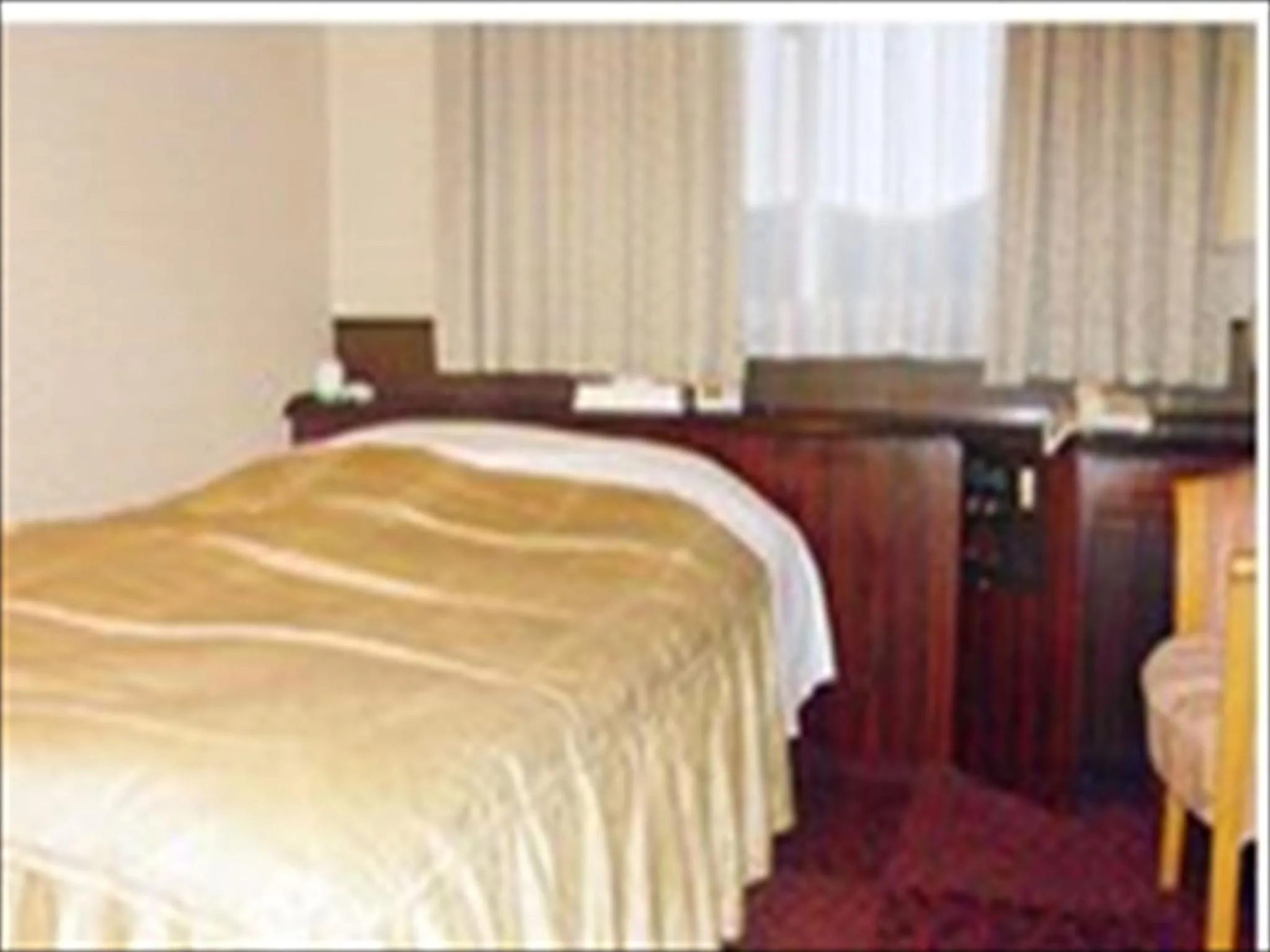 Bed in Hotel CROWN HILLS MIYOSHI