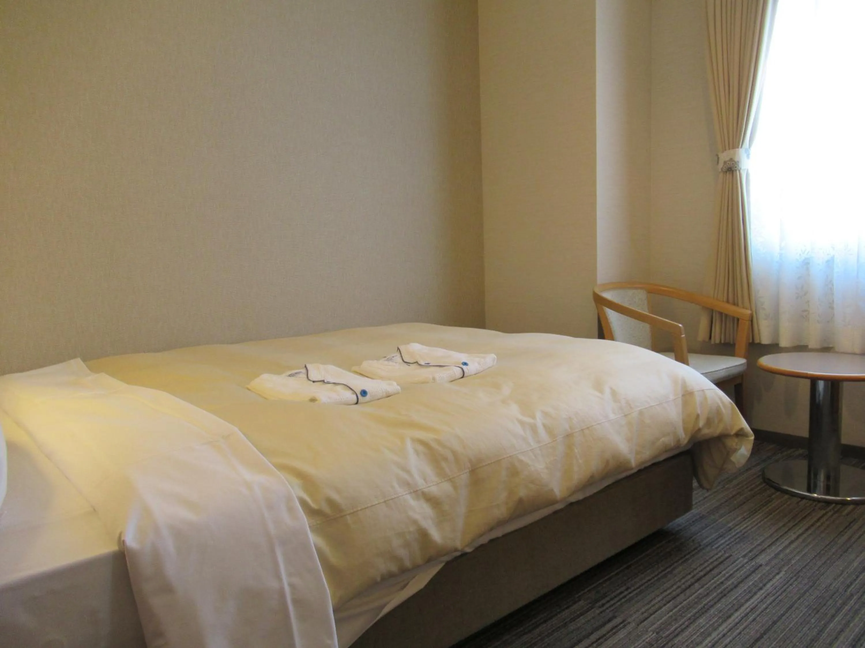 Photo of the whole room, Bed in Center Hotel Mihara