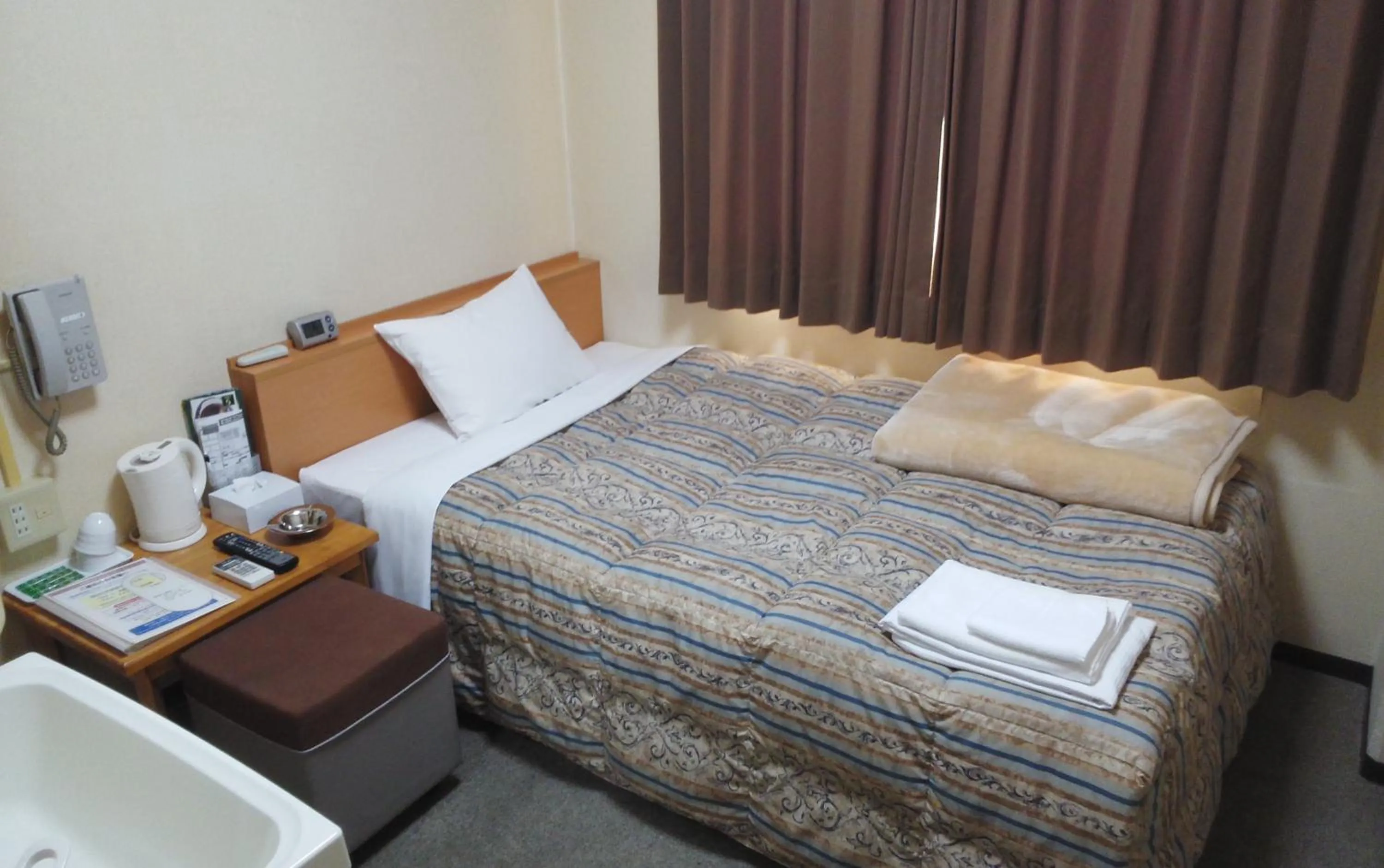 Photo of the whole room, Bed in Hotel Miyako Hills