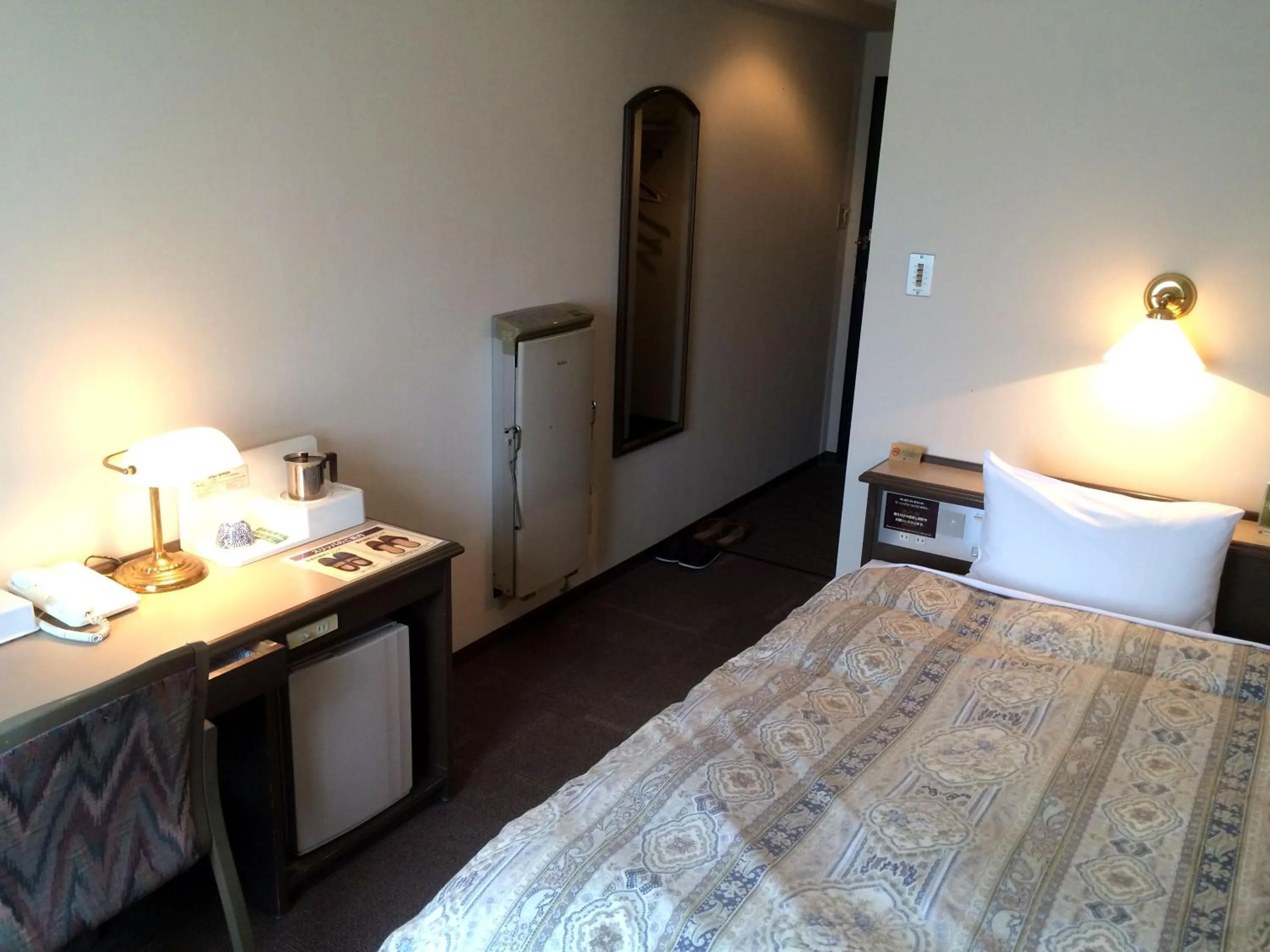 Photo of the whole room, Bed in Hotel Crown Hills Takaoka