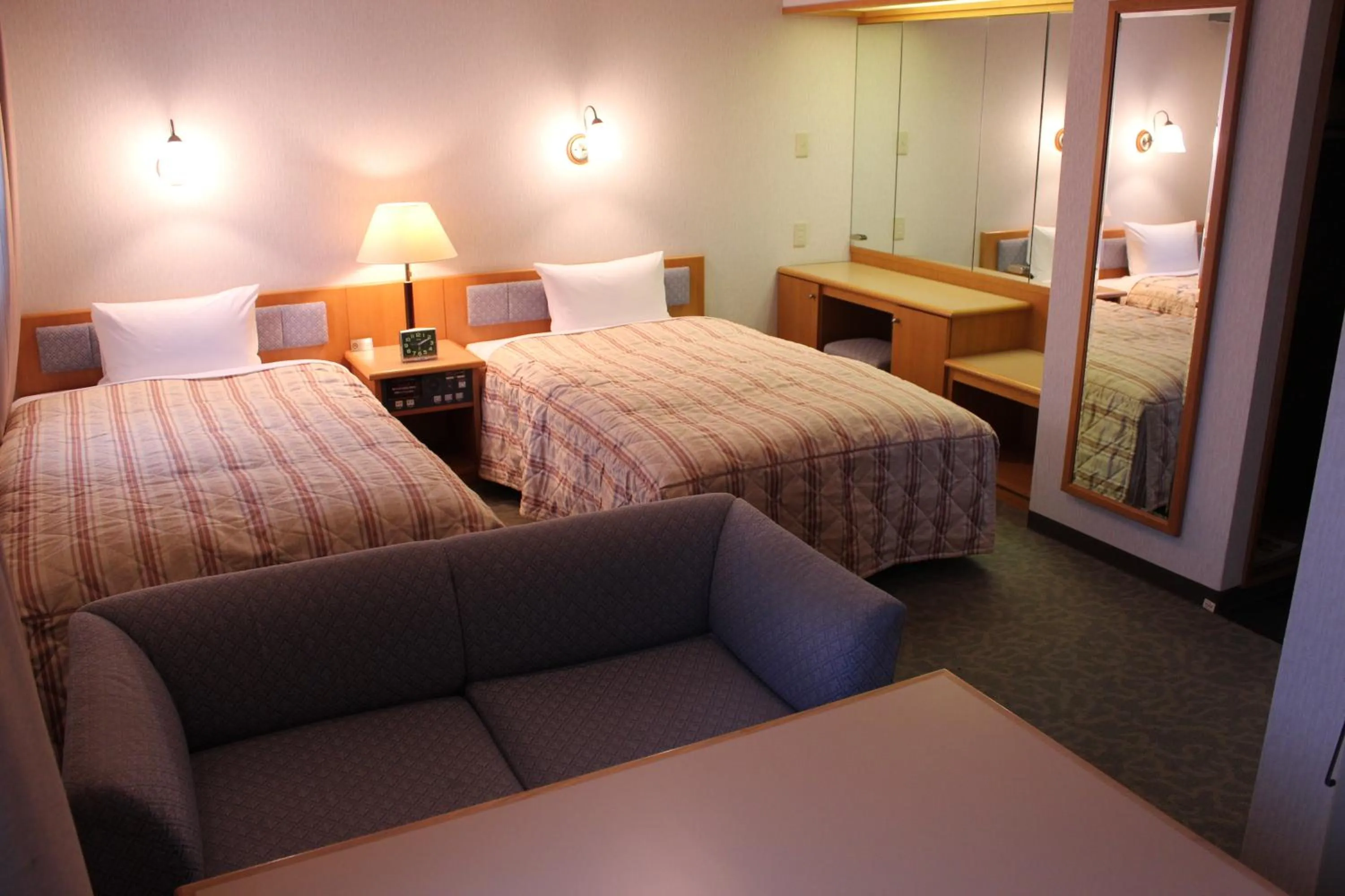 Photo of the whole room, Bed in Hotel Crown Hills Takaoka