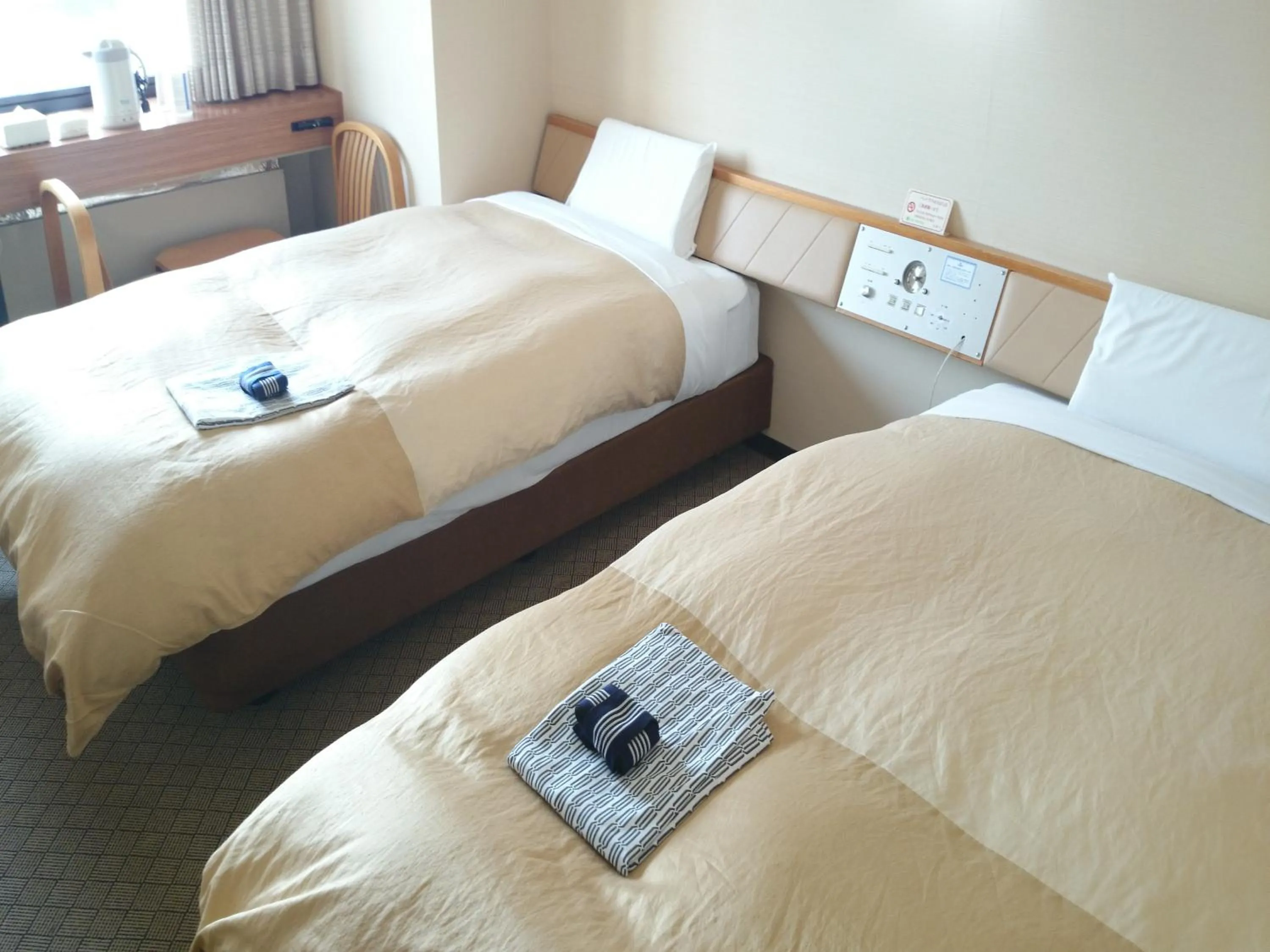 Bed in Hotel Furukawa Hills