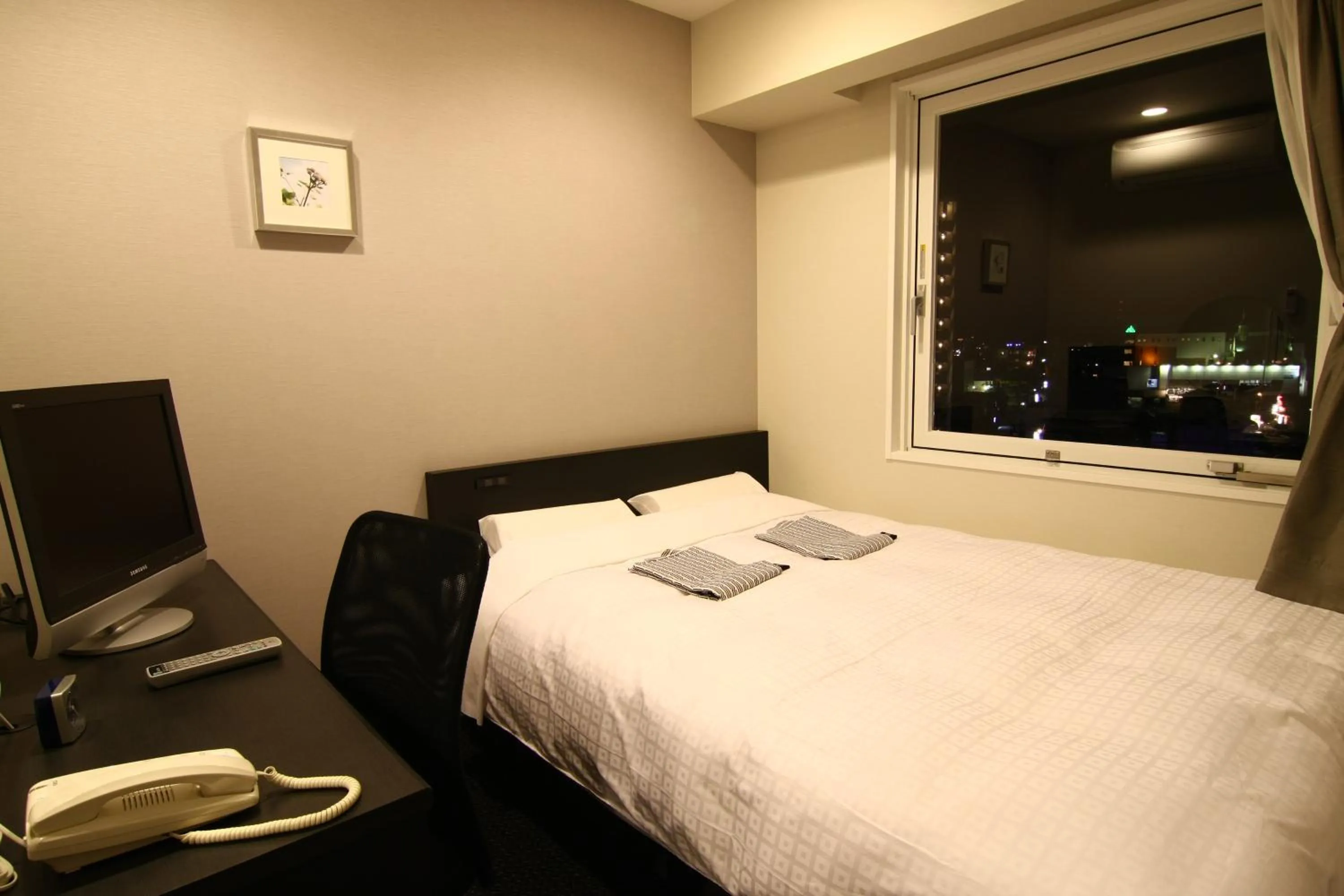 Bed in Hotel Crown Hills Kimitsu