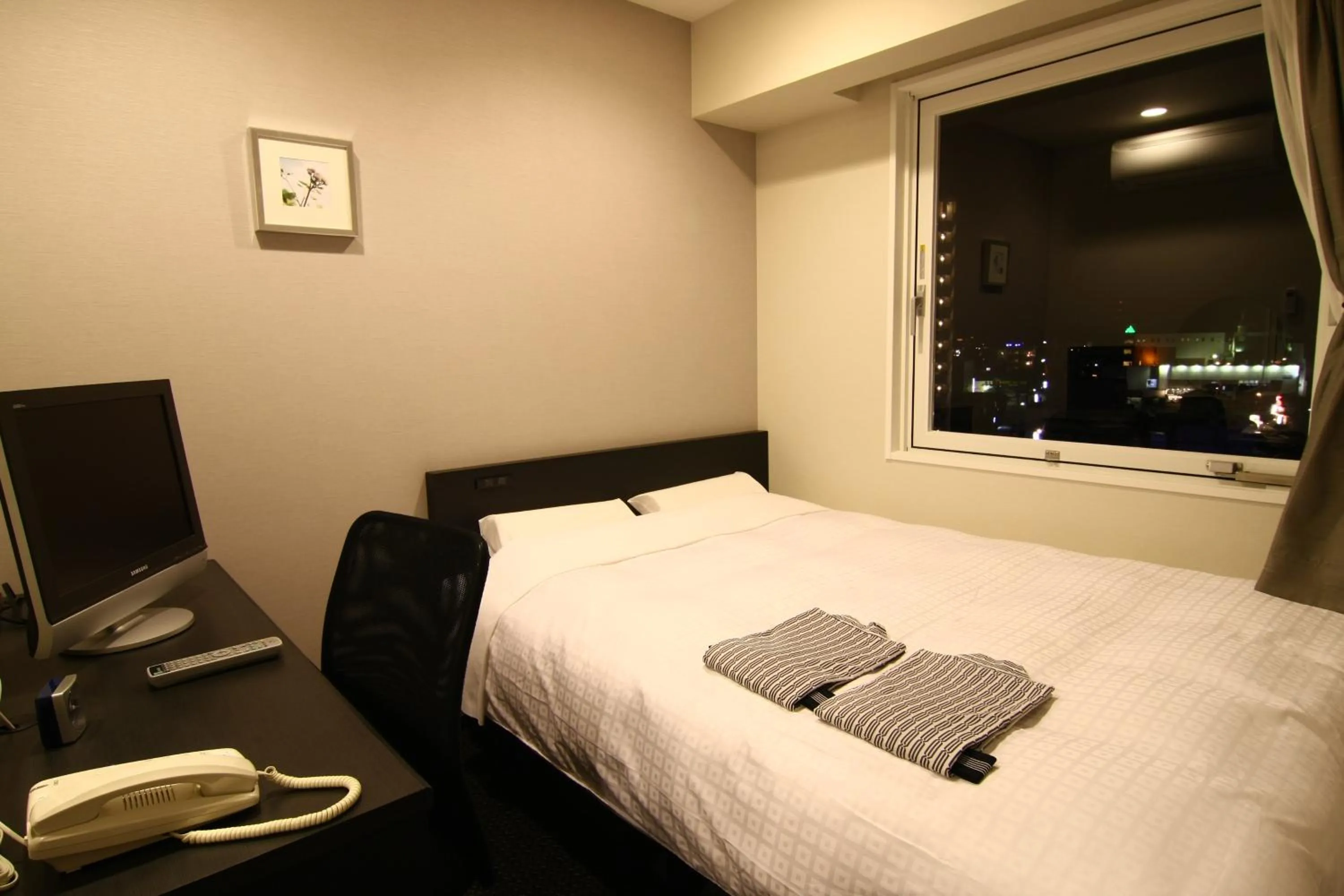 Bed in Hotel Crown Hills Kimitsu