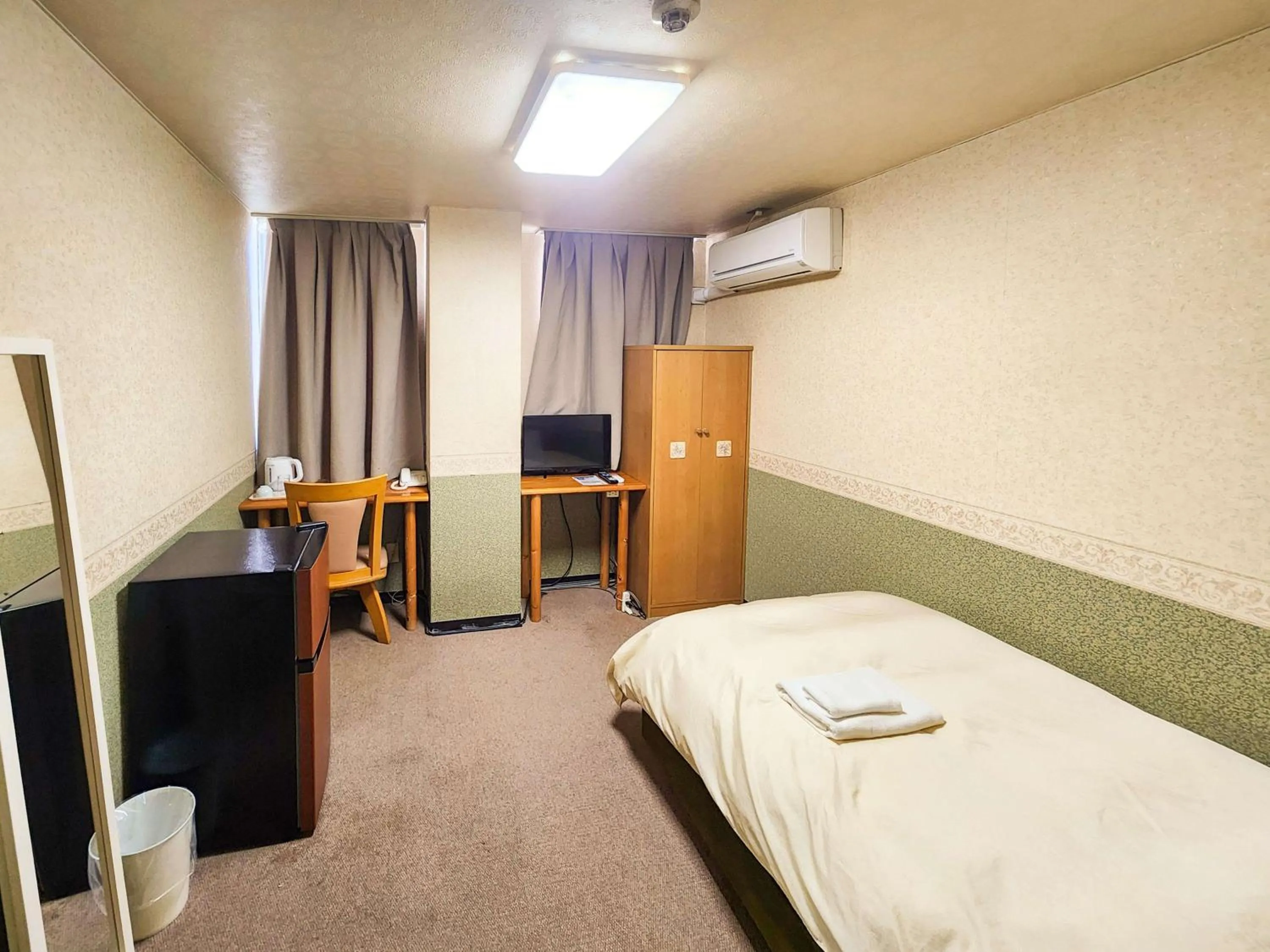 Photo of the whole room, Bed in Hotel Himeji Hills