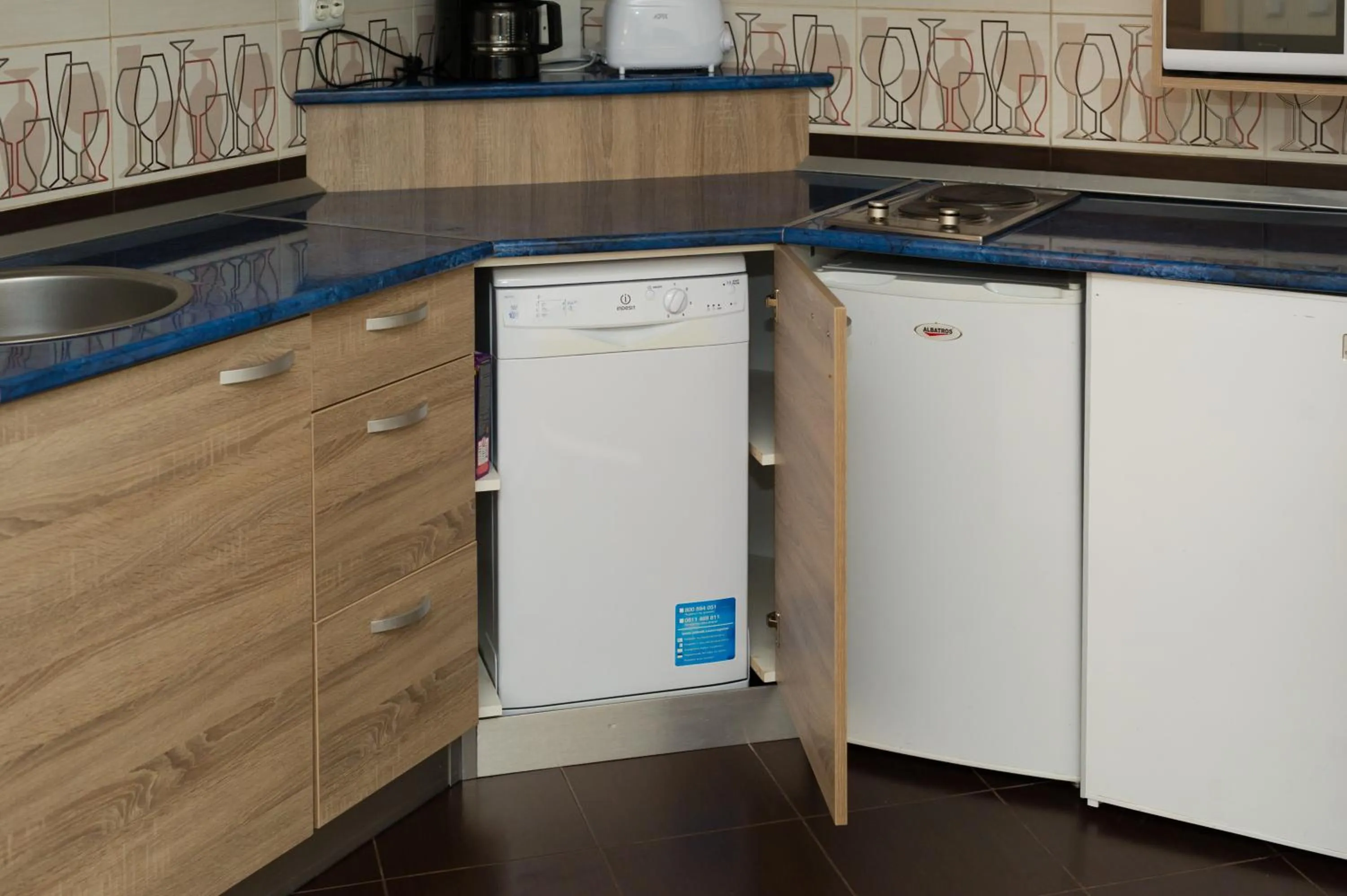 Kitchen or kitchenette in Aparthotel Metropol