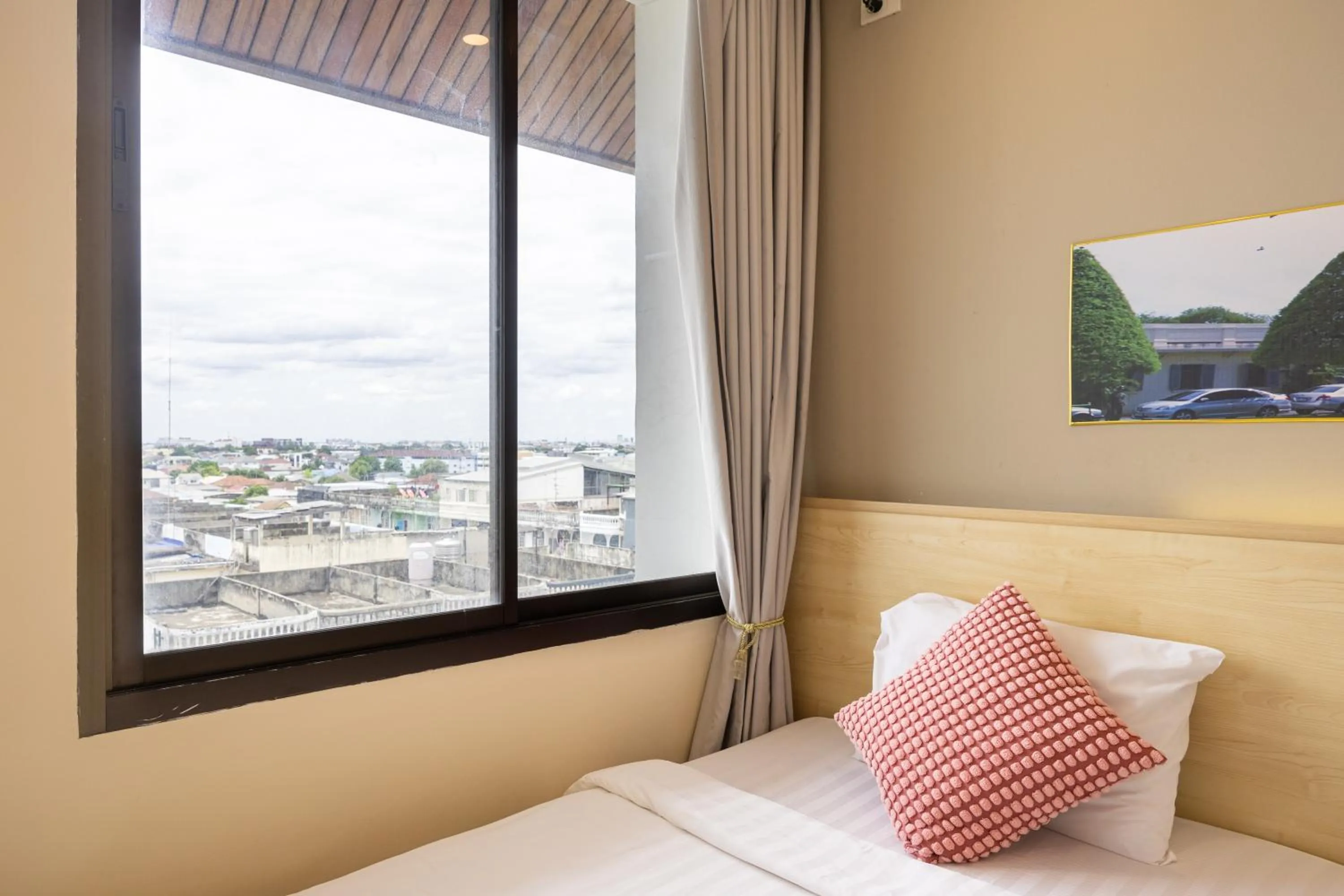 Bedroom, Bed in The President Hotel at Chokchai 4
