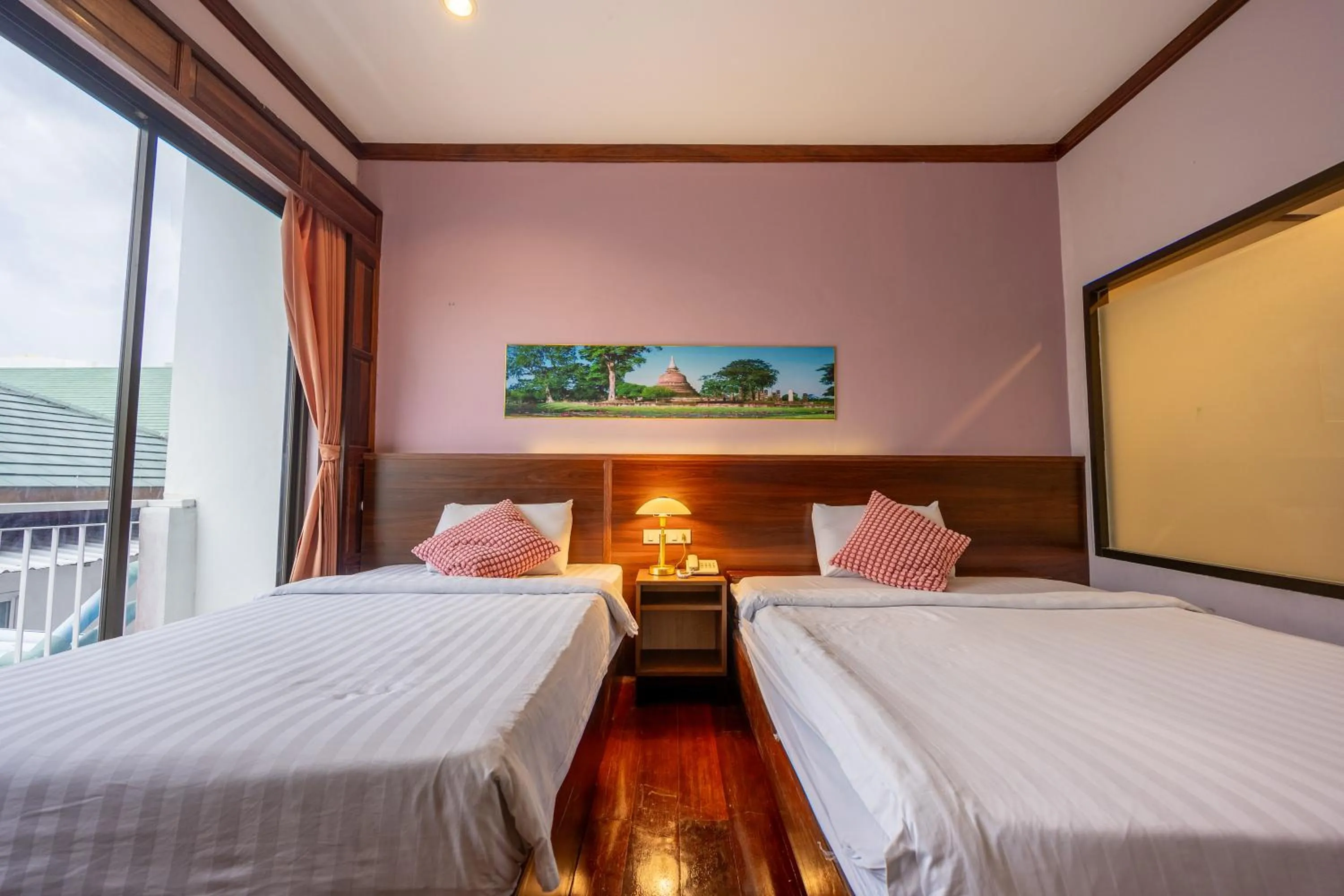 Bed in The President Hotel at Chokchai 4