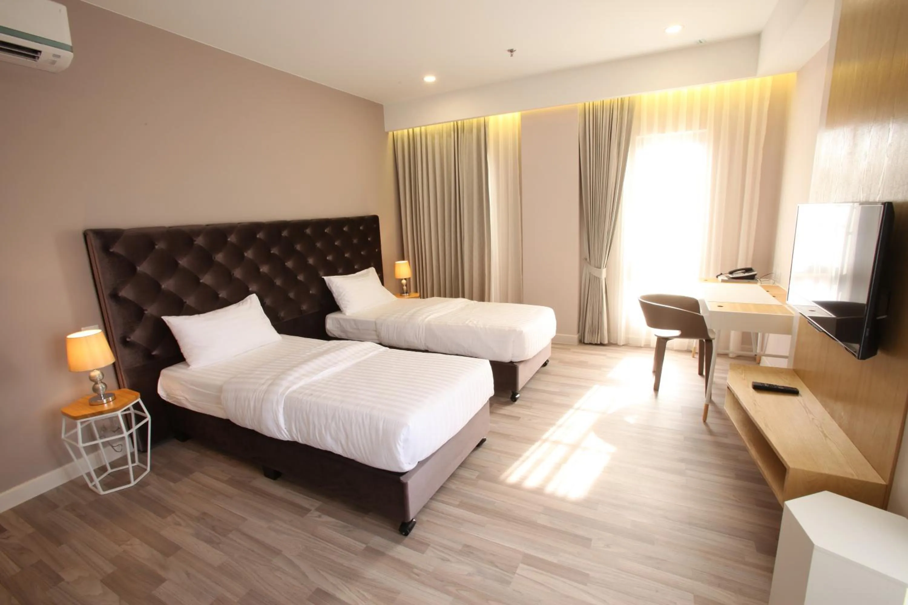 Bed in D'Anggerek Serviced Apartment