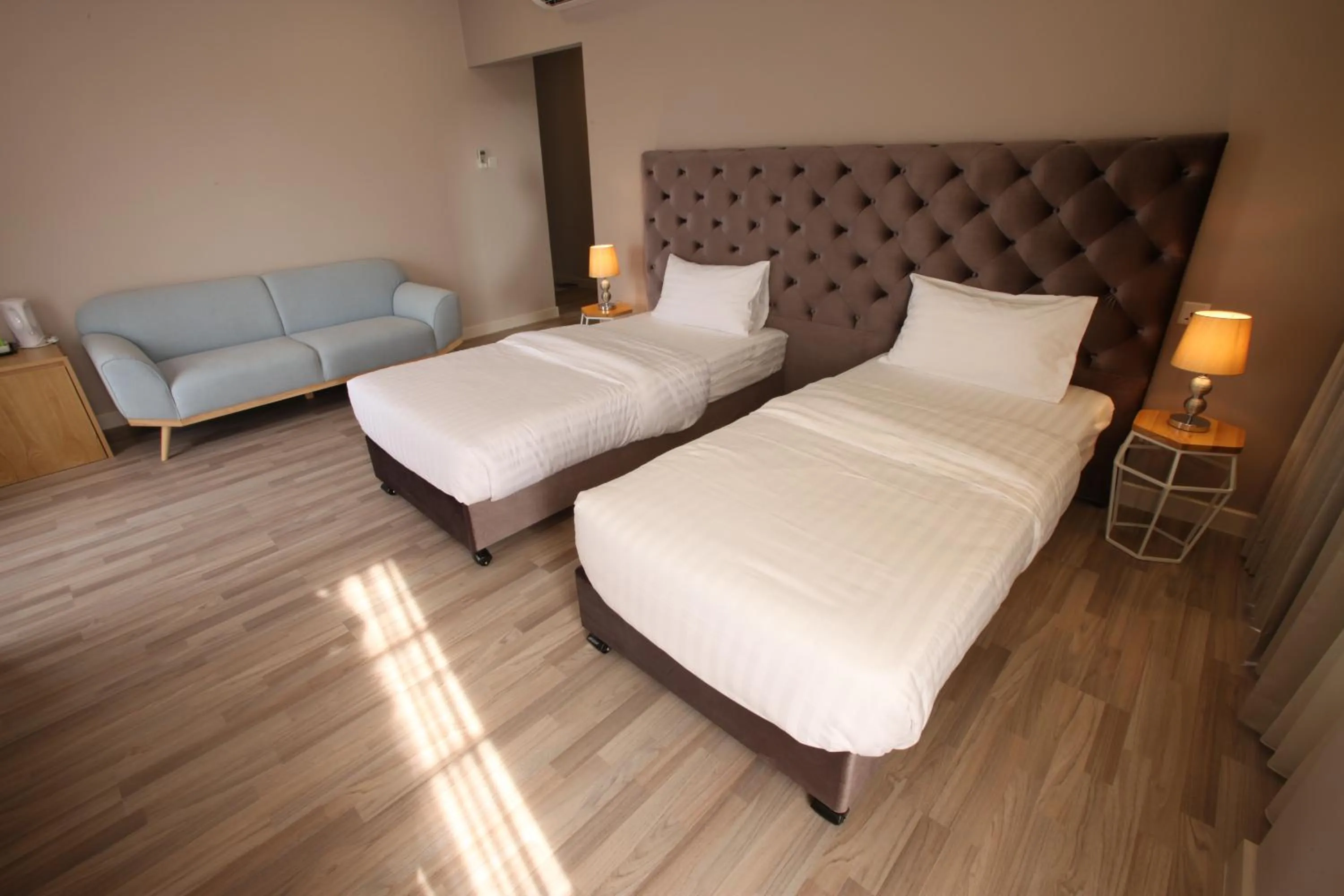 Bed in D'Anggerek Serviced Apartment
