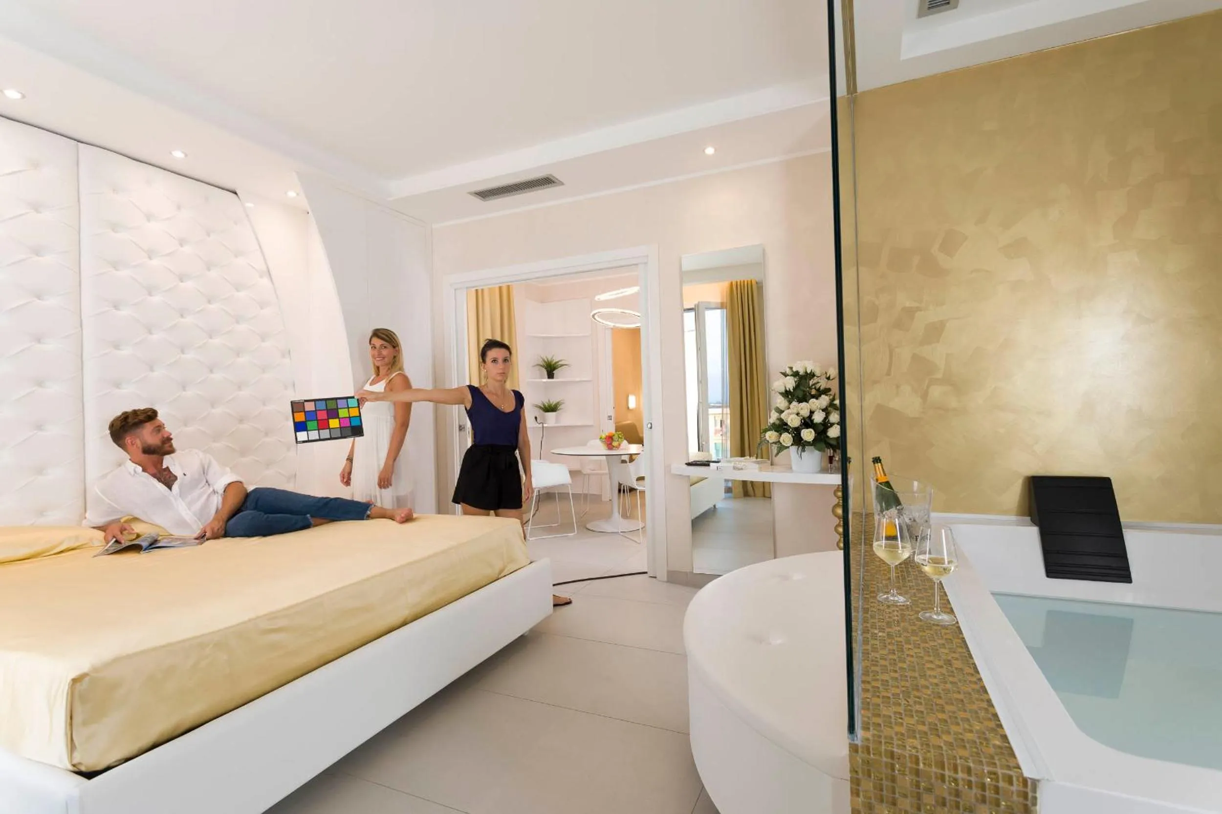 Bed in White Suite & Apartments