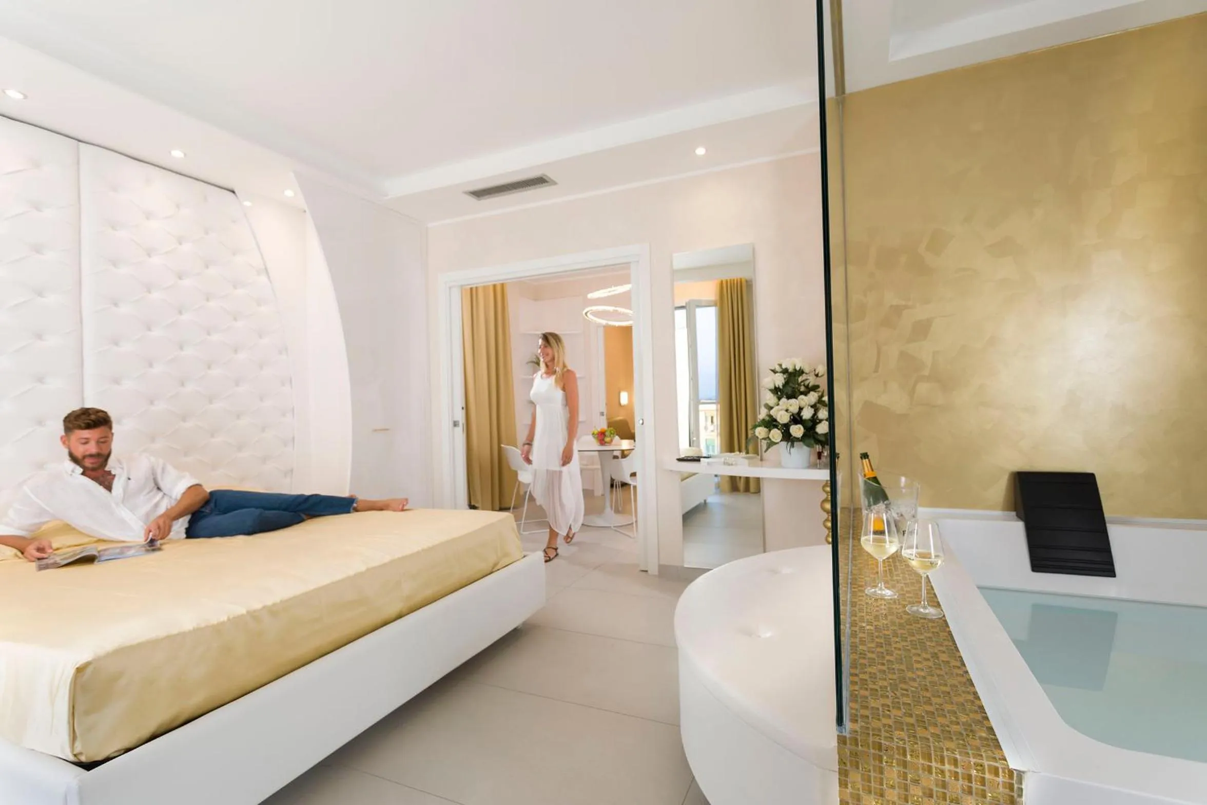 People, Bed in White Suite & Apartments