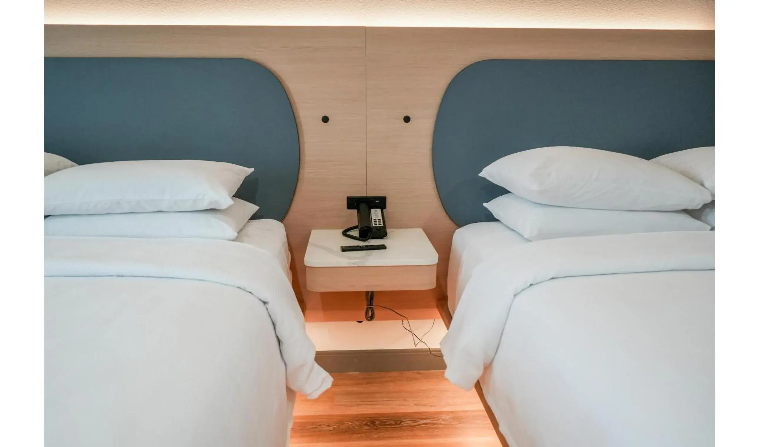 Premium Two Queen Room with Balcony- Hearing Accessible in Hotel Lydia Premium Two Queen Room with Balcony- Hearing Accessible in Hotel Lydia