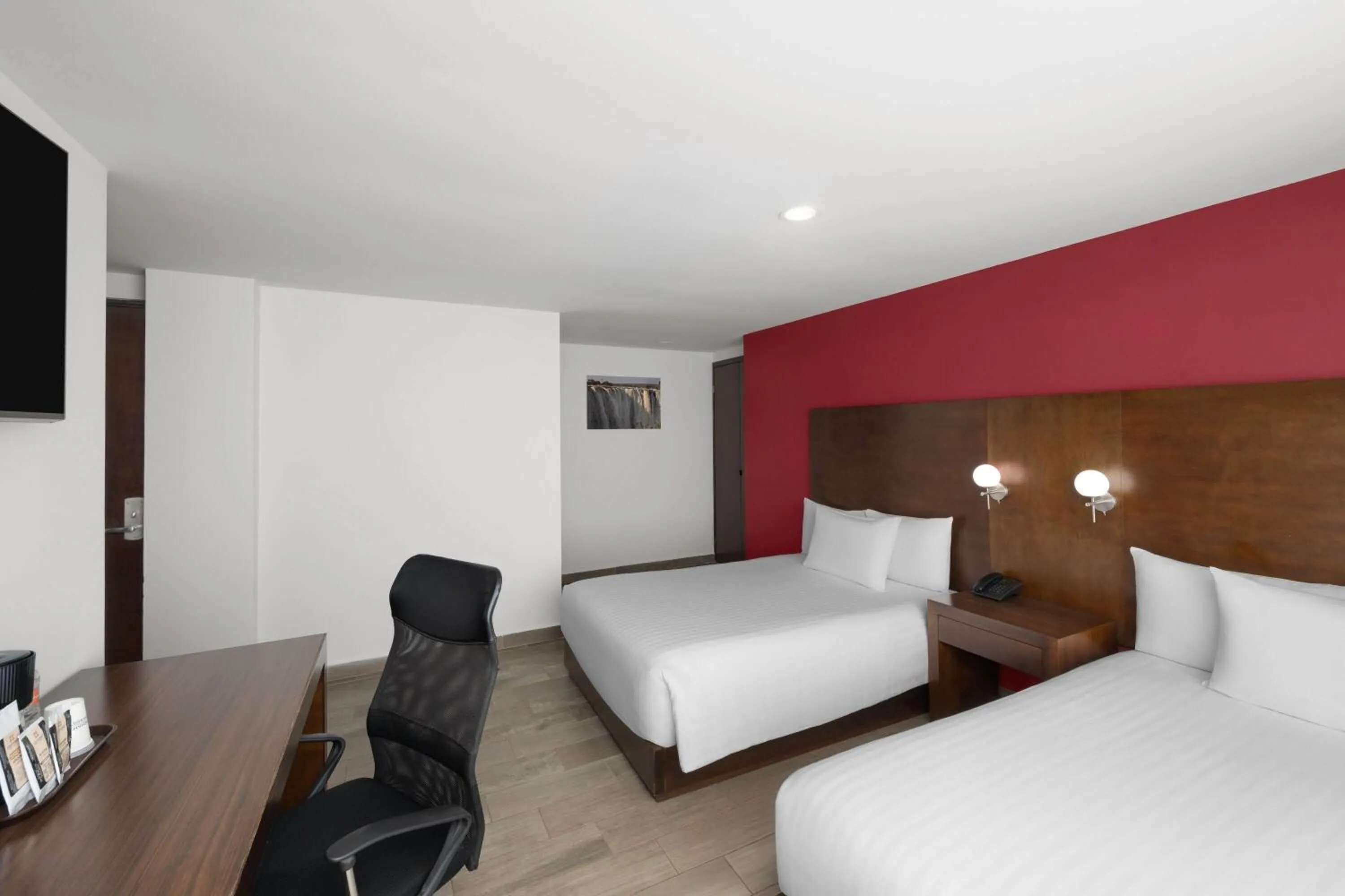 Photo of the whole room, Bed in Ramada by Wyndham Tampico Centro
