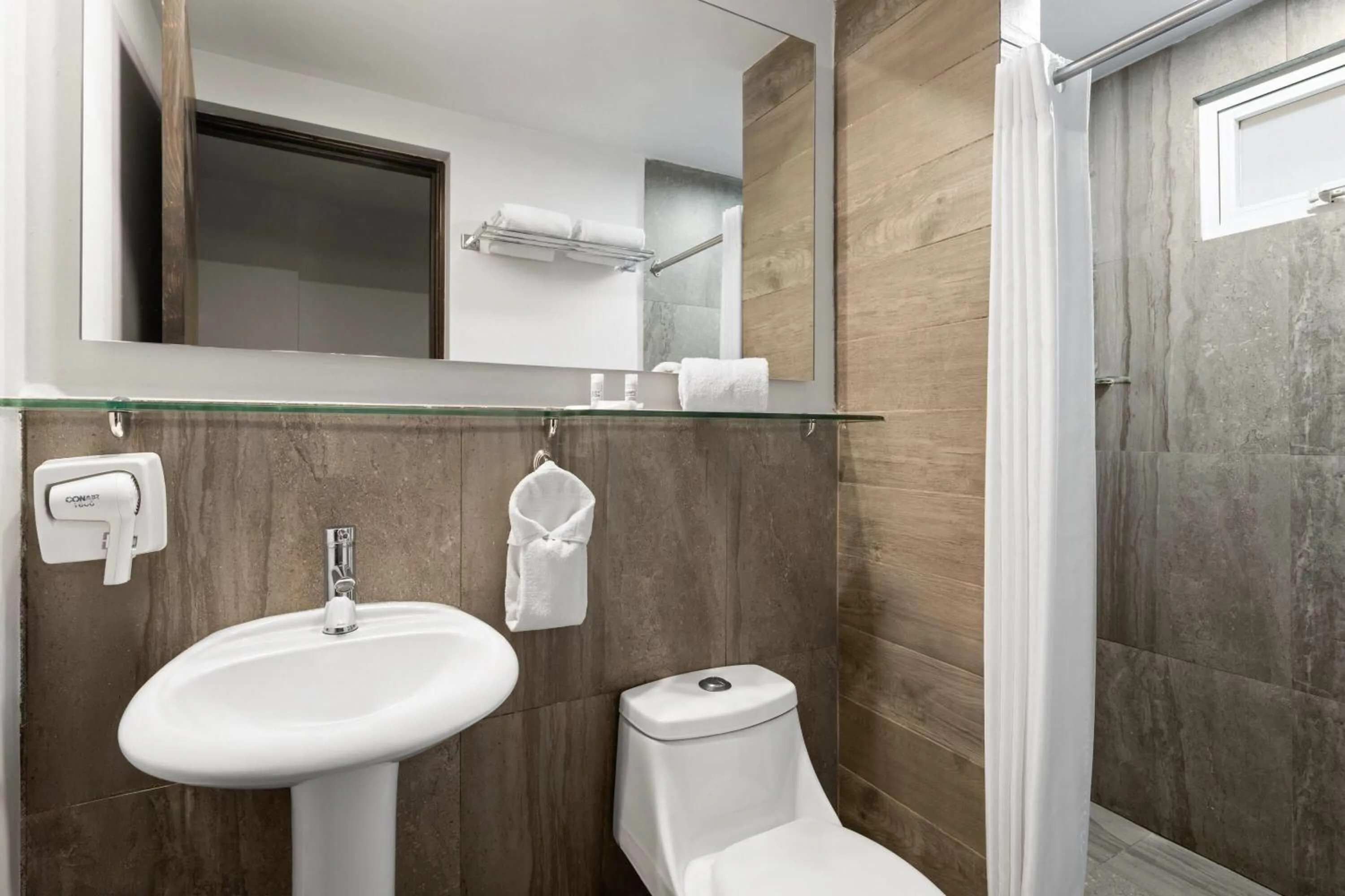 Bathroom in Ramada by Wyndham Tampico Centro