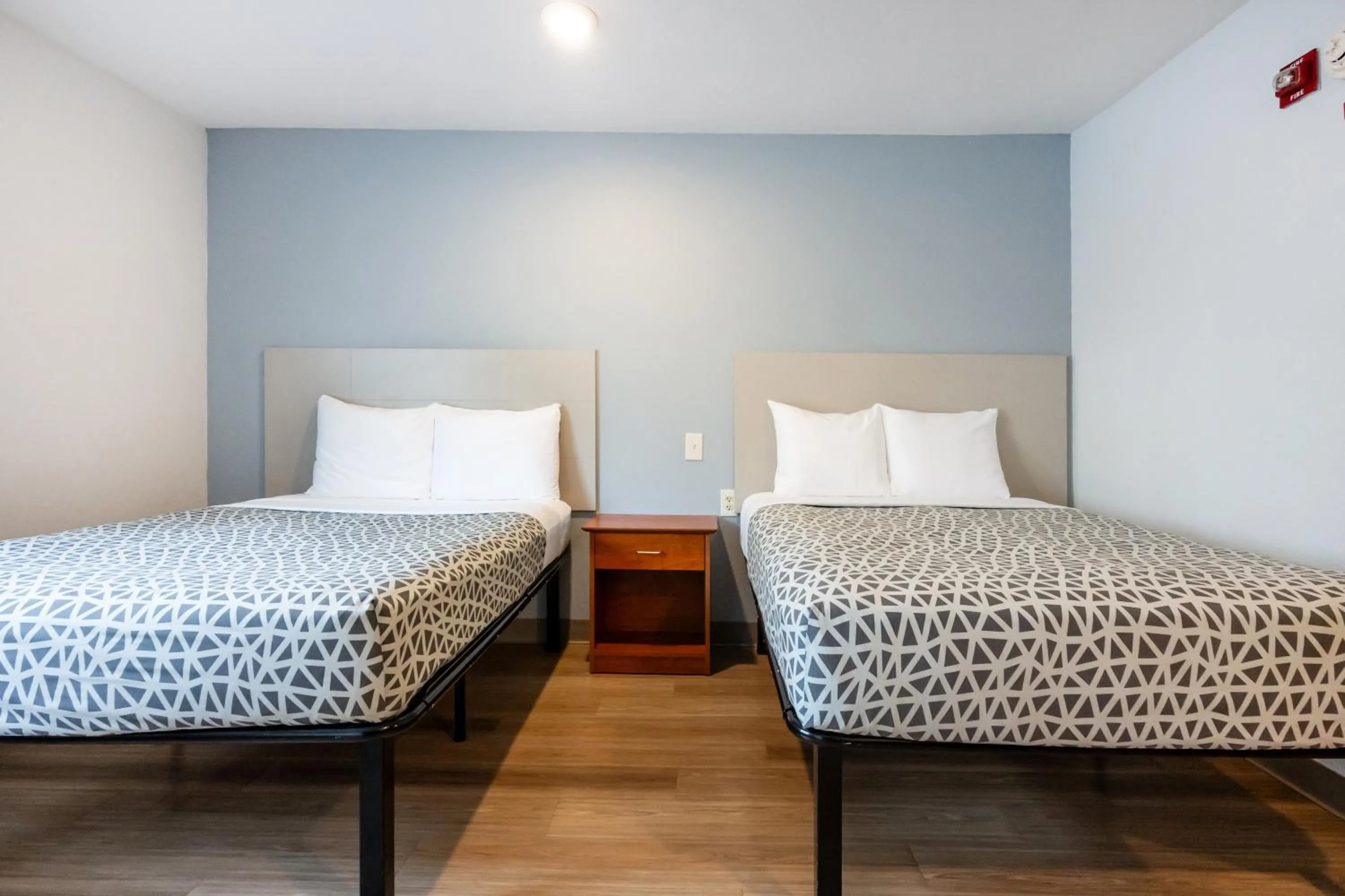 Bedroom, Bed in Suburban Studios Huntsville University Area