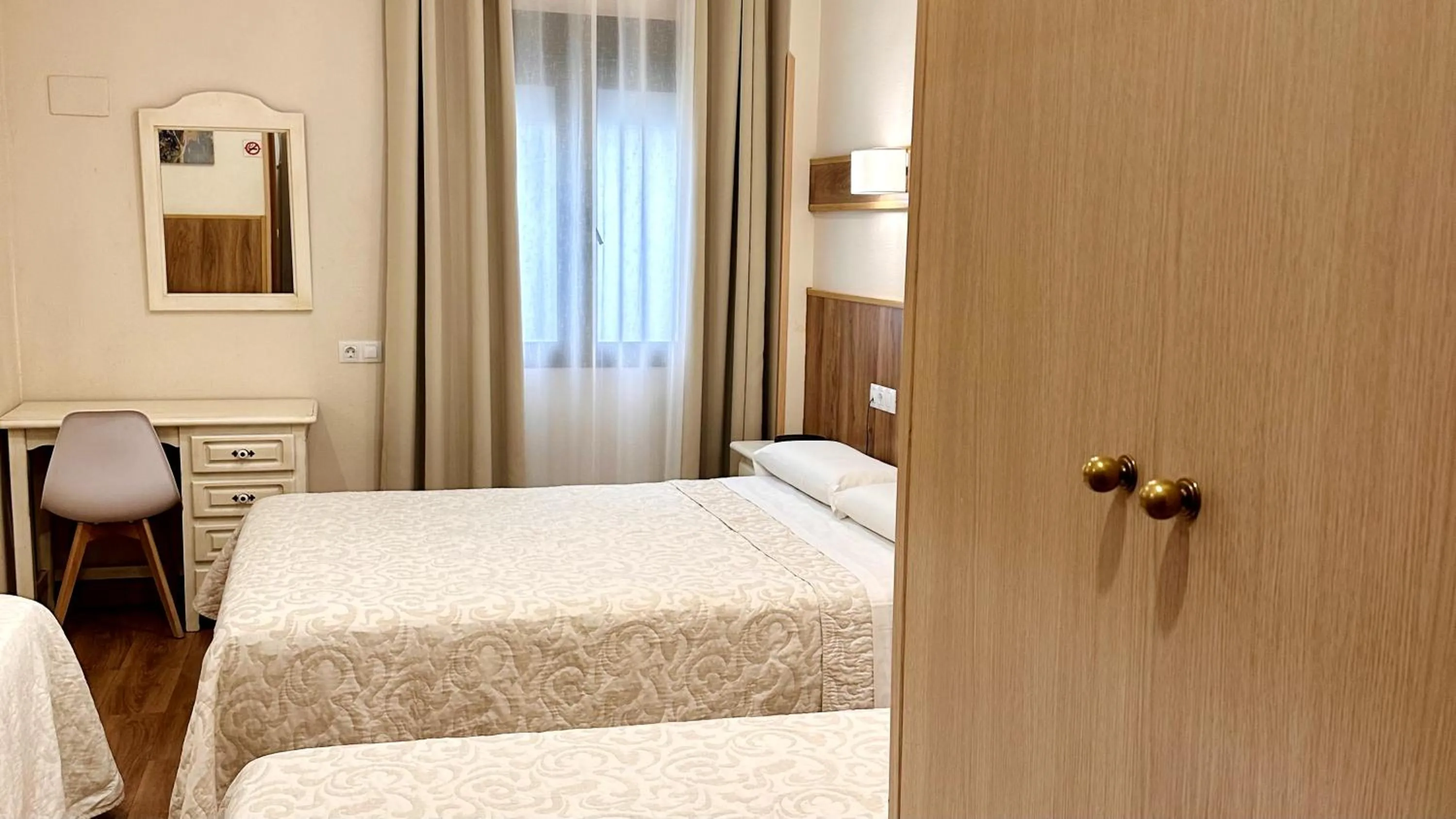 Photo of the whole room, Bed in Hostal Toledo