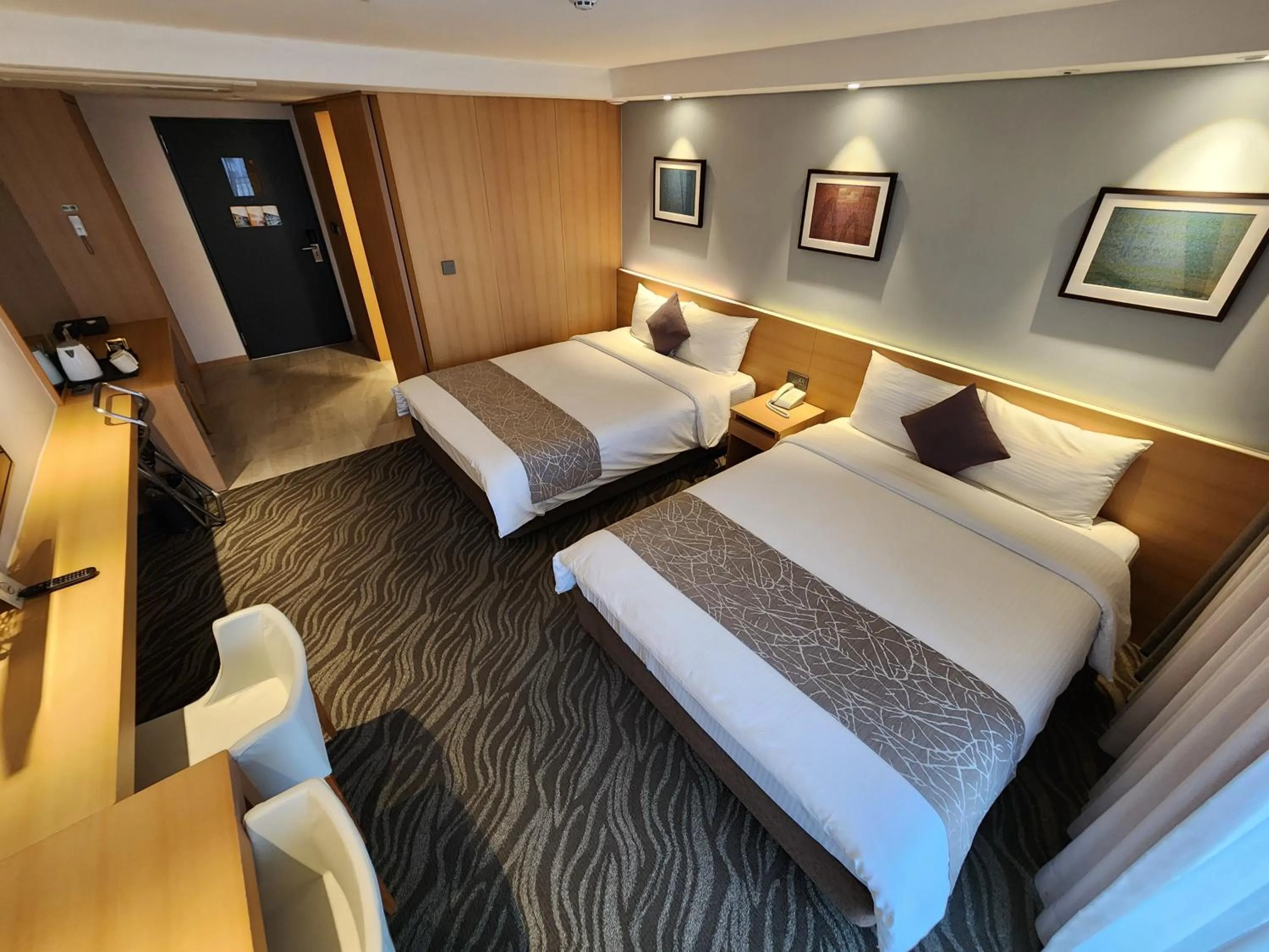 Bed in Seogwipo JS Hotel