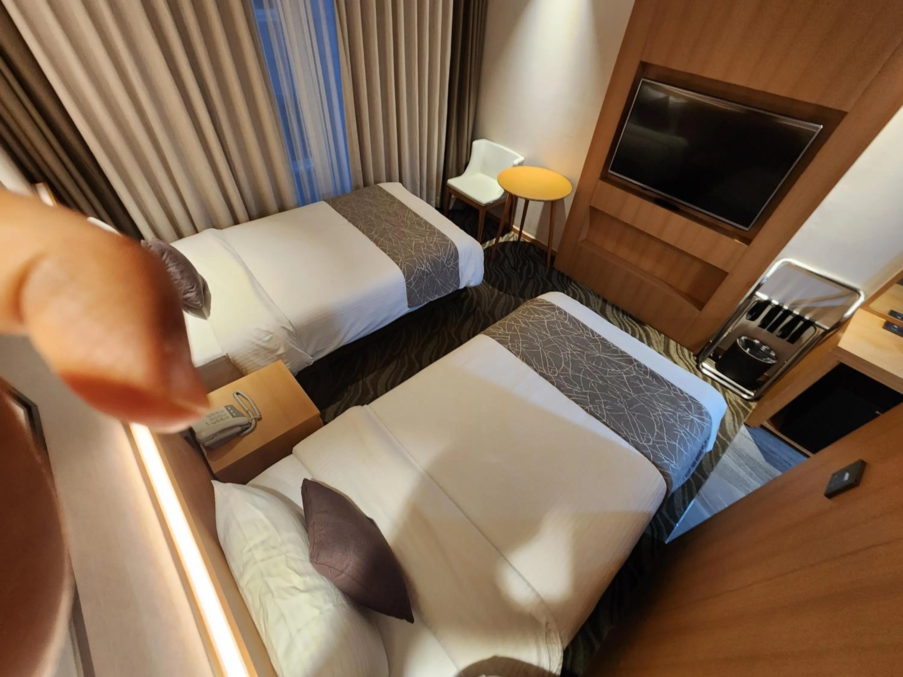 Bed in Seogwipo JS Hotel