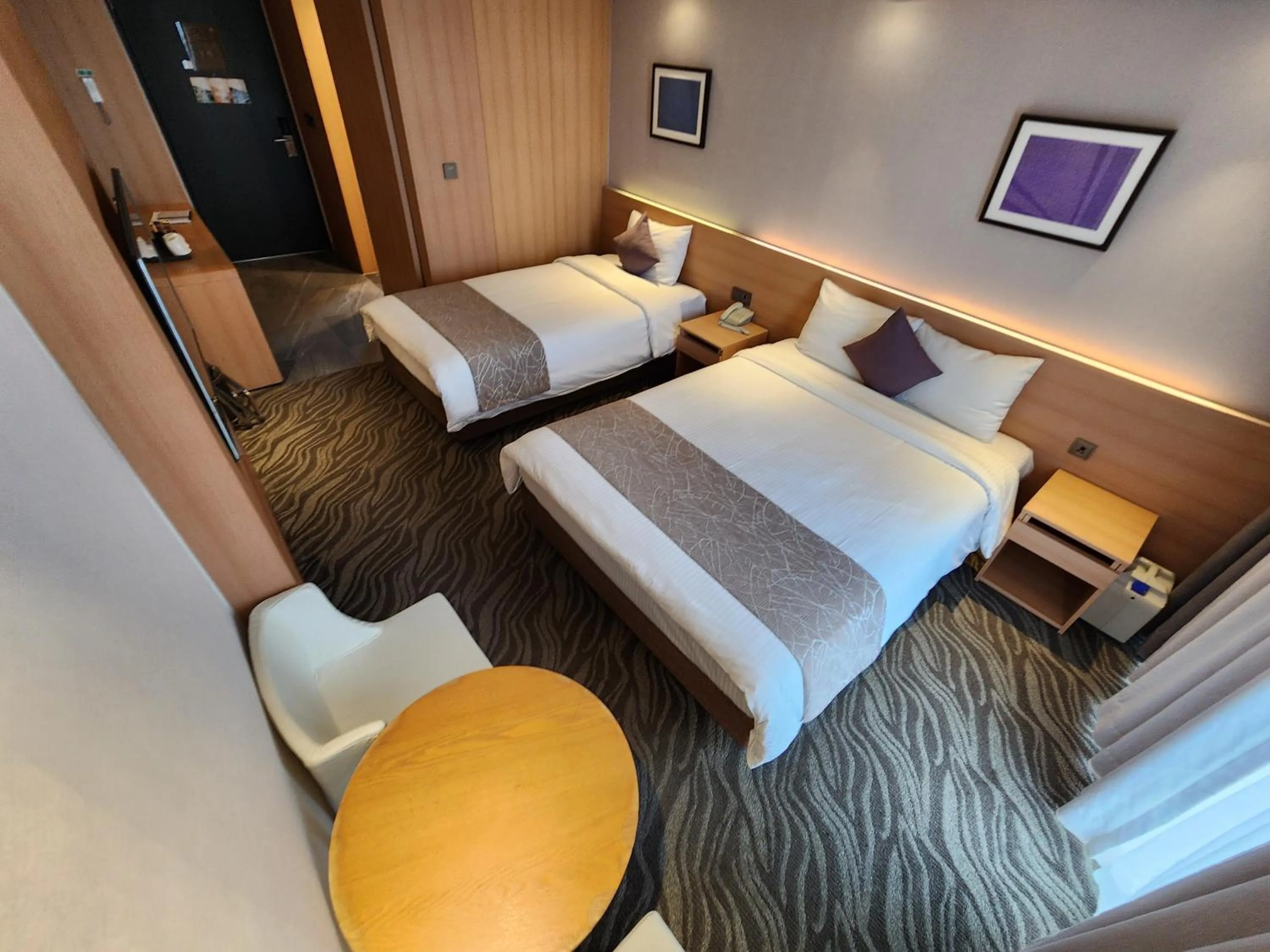 Bed in Seogwipo JS Hotel