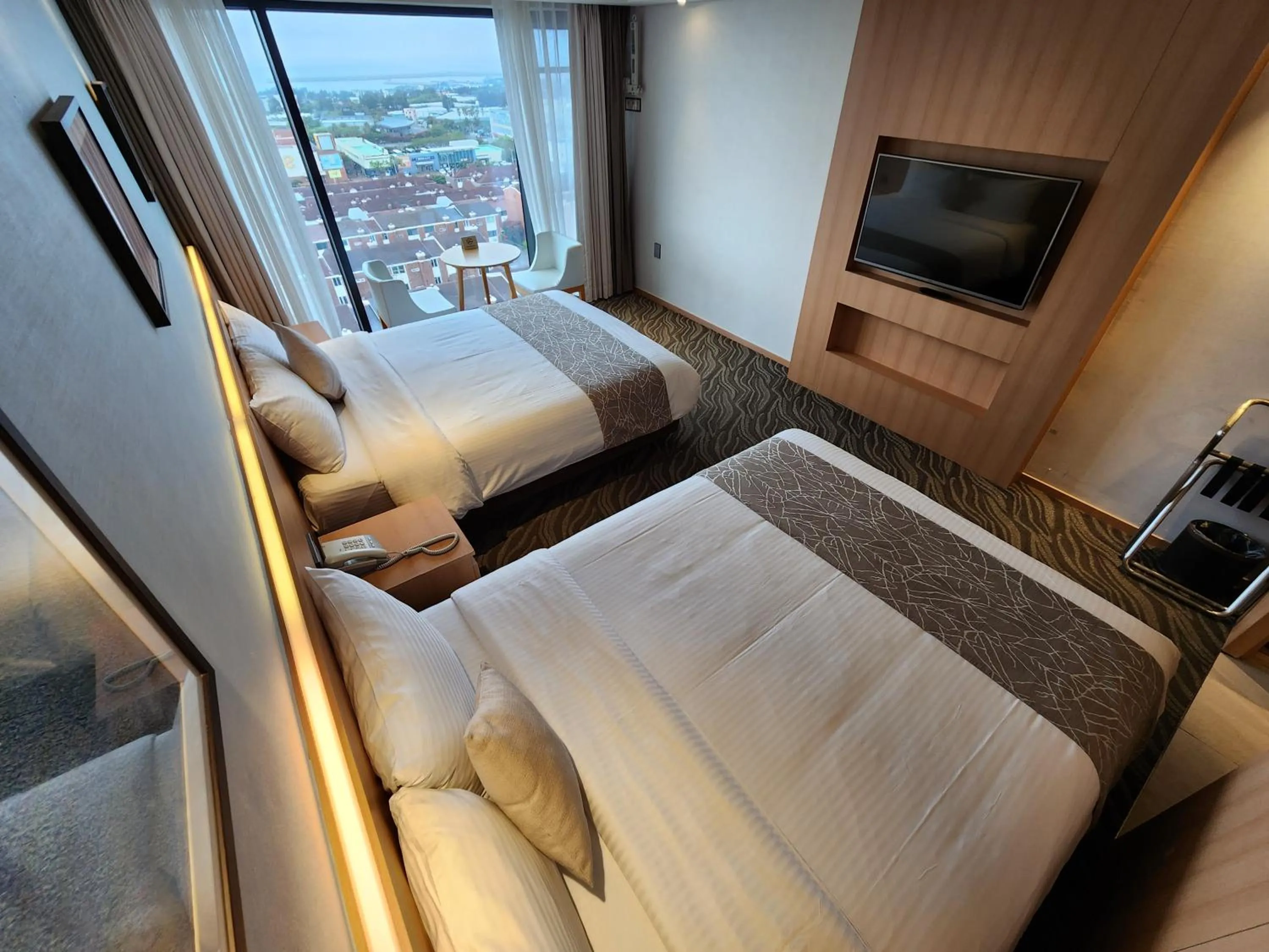 Bed in Seogwipo JS Hotel