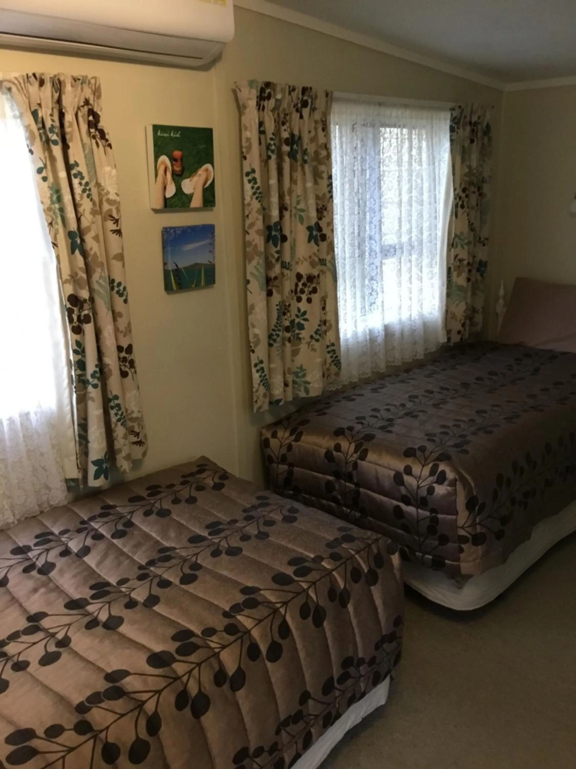 Bed in Waitomo Caves Guest Lodge