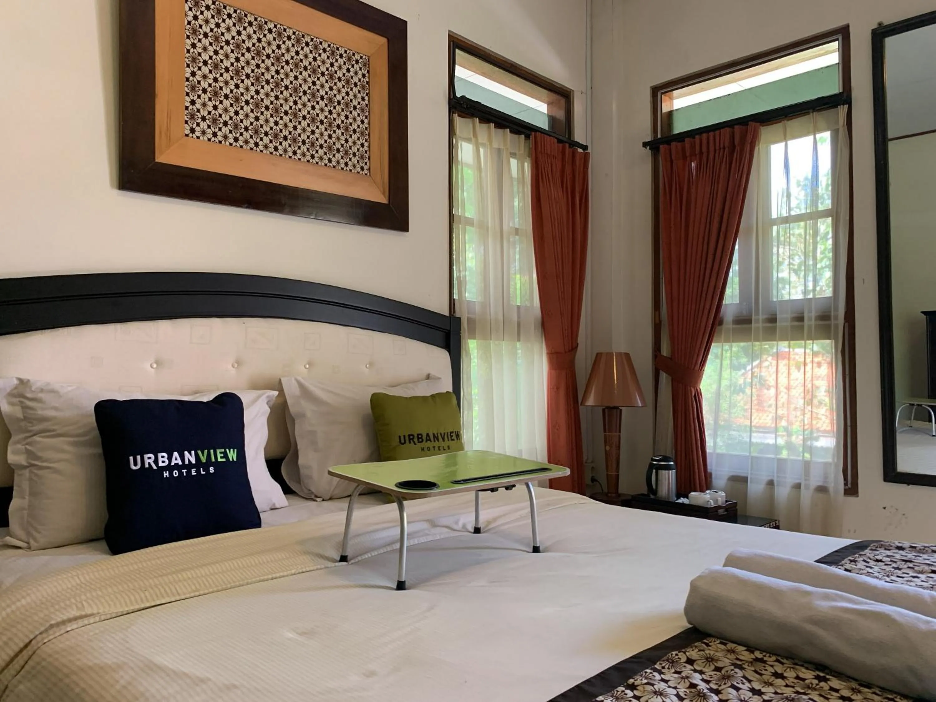 Bed in Urbanview Sasono Putro Condoongcatur by RedDoorz