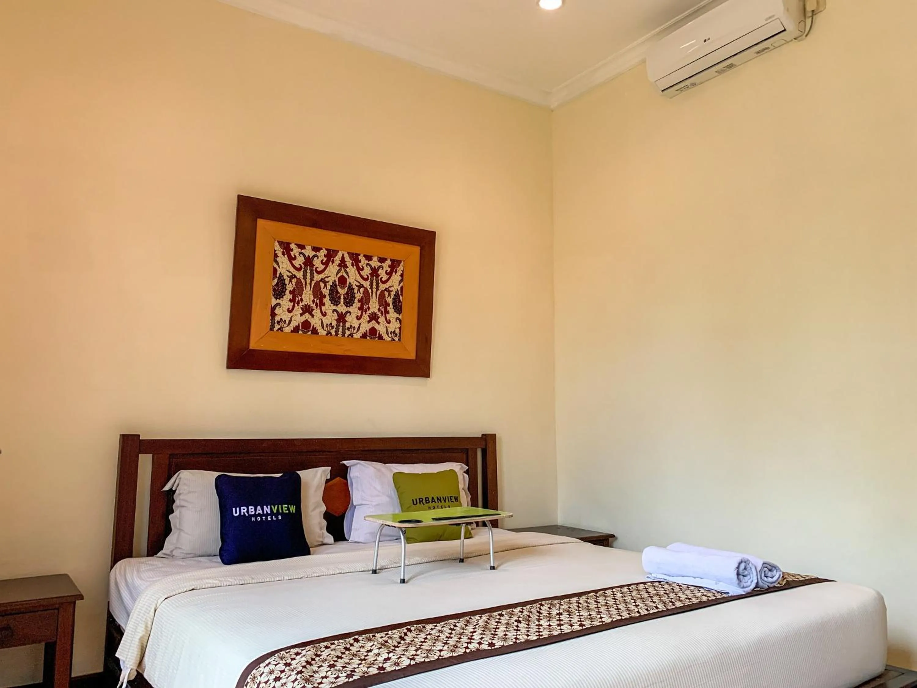 Bed in Urbanview Sasono Putro Condoongcatur by RedDoorz