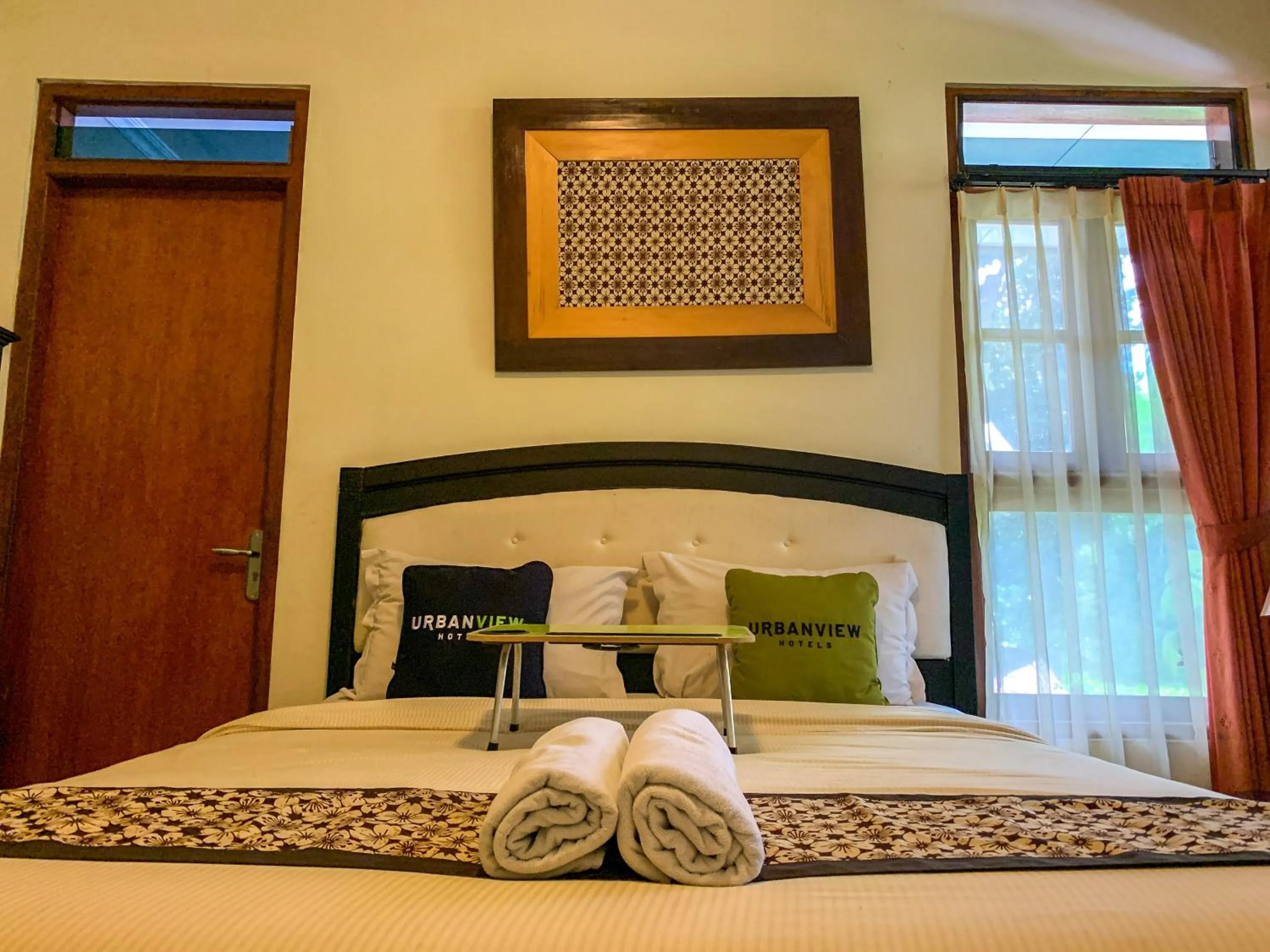 Bed in Urbanview Sasono Putro Condoongcatur by RedDoorz