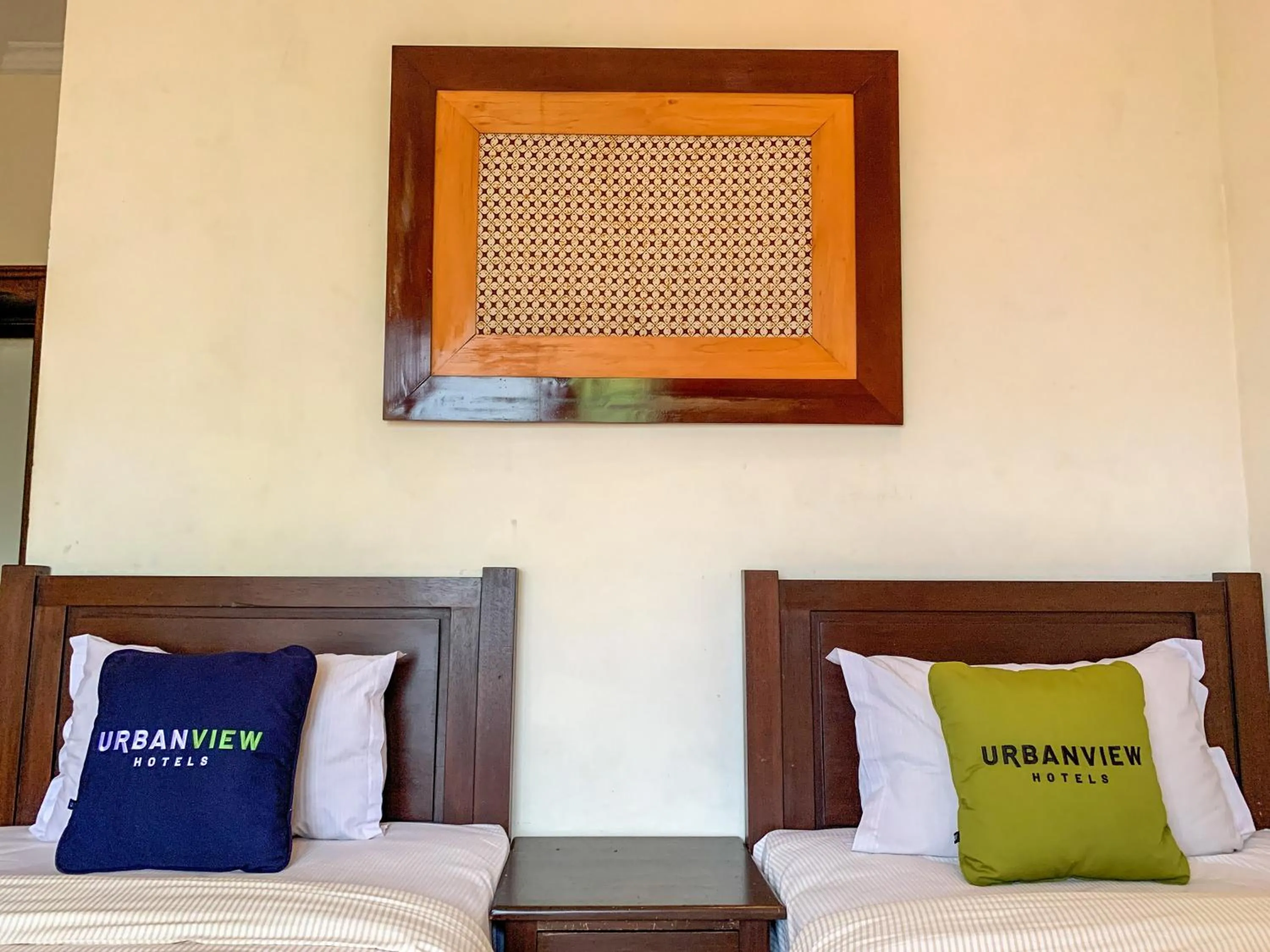 Bed in Urbanview Sasono Putro Condoongcatur by RedDoorz