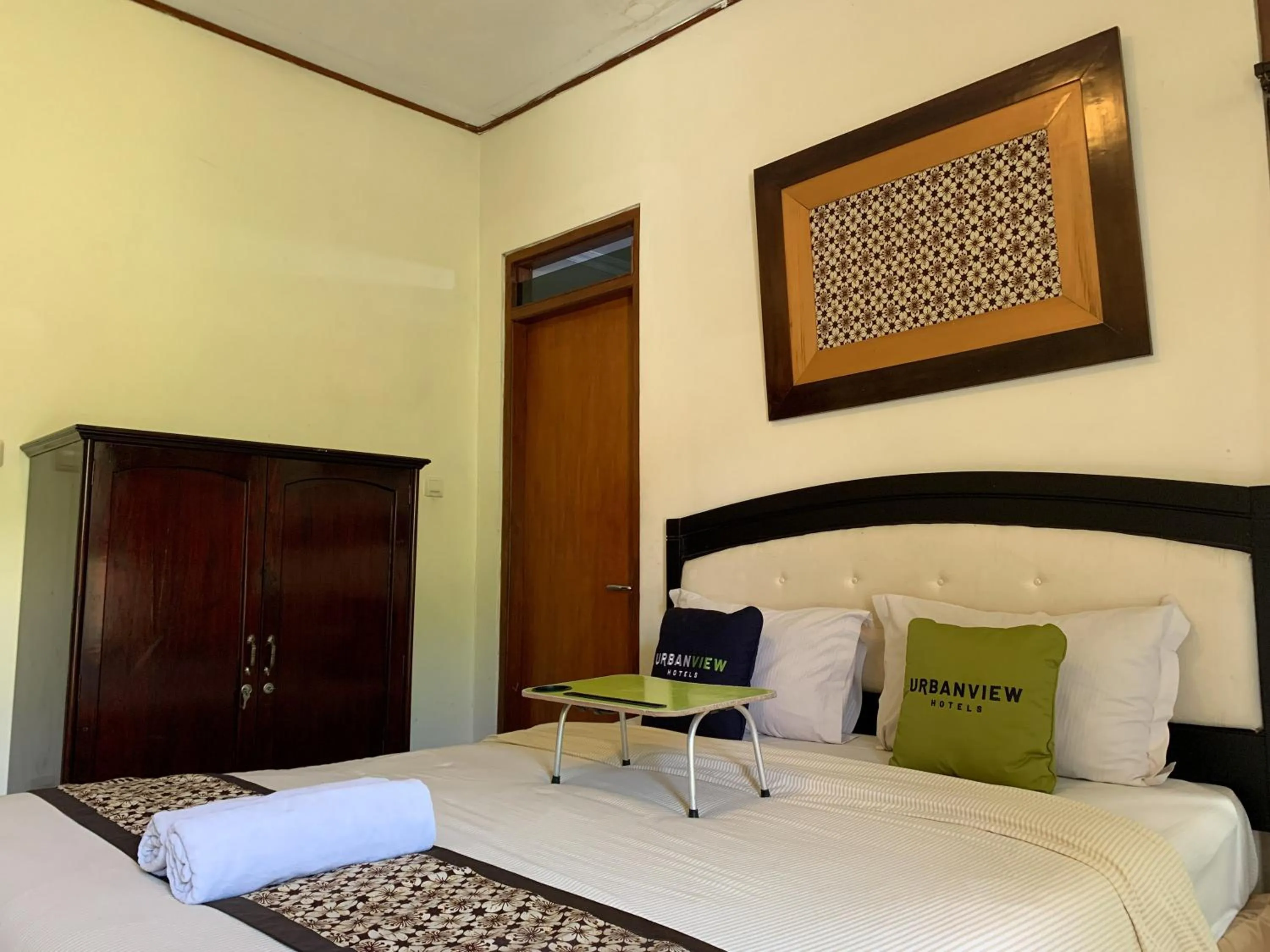 Bed in Urbanview Sasono Putro Condoongcatur by RedDoorz