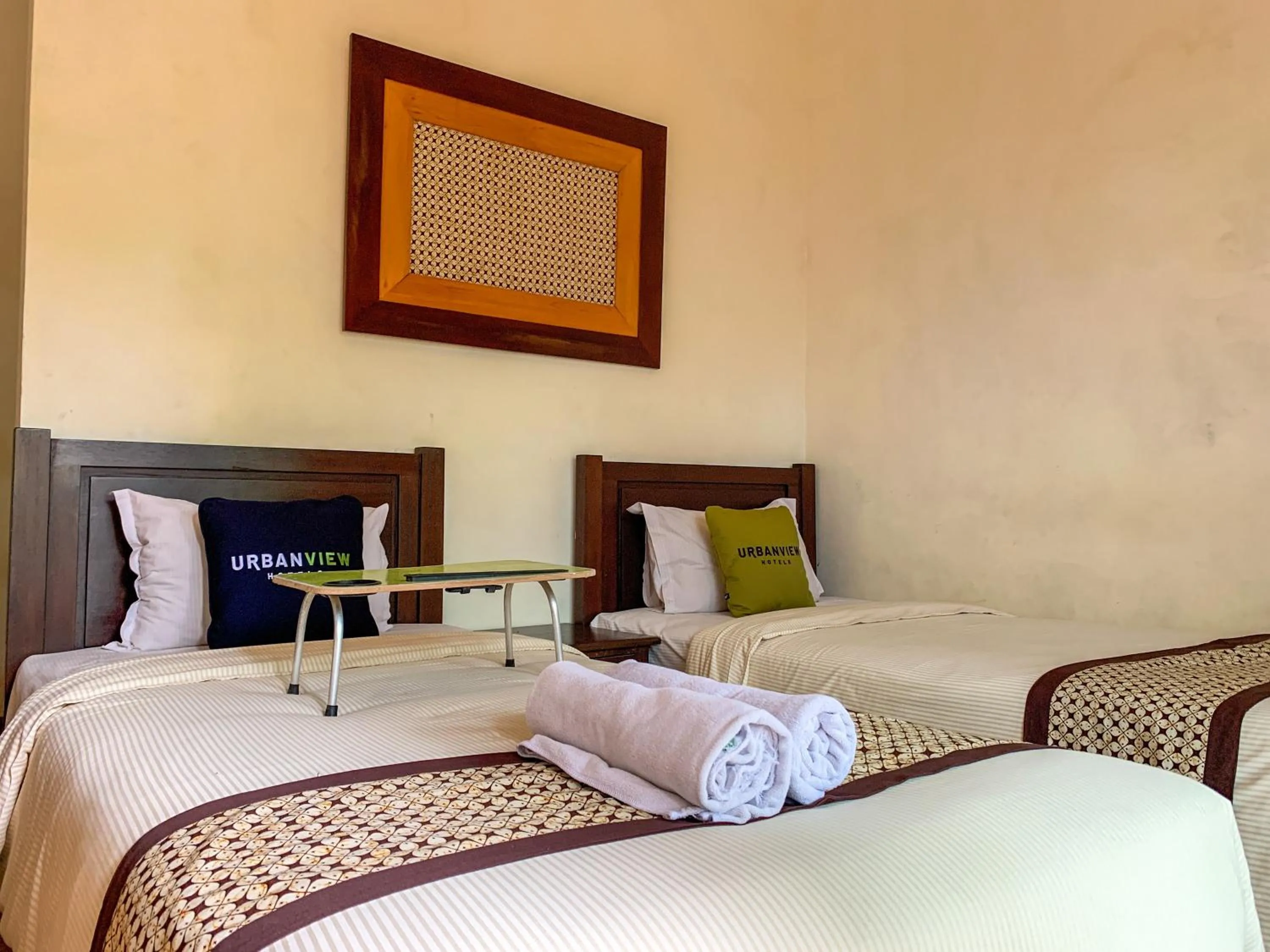 Bed in Urbanview Sasono Putro Condoongcatur by RedDoorz