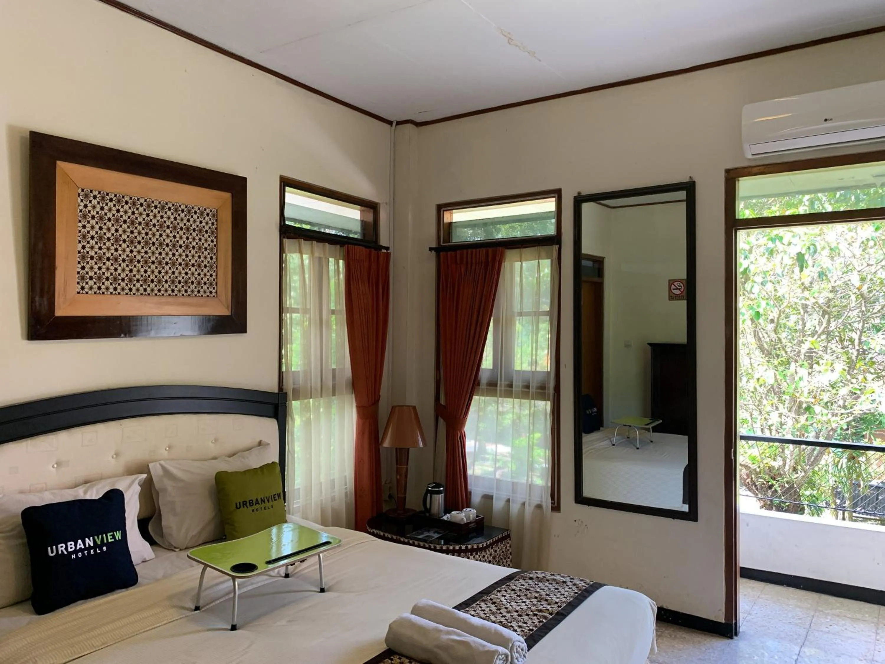 Bed in Urbanview Sasono Putro Condoongcatur by RedDoorz