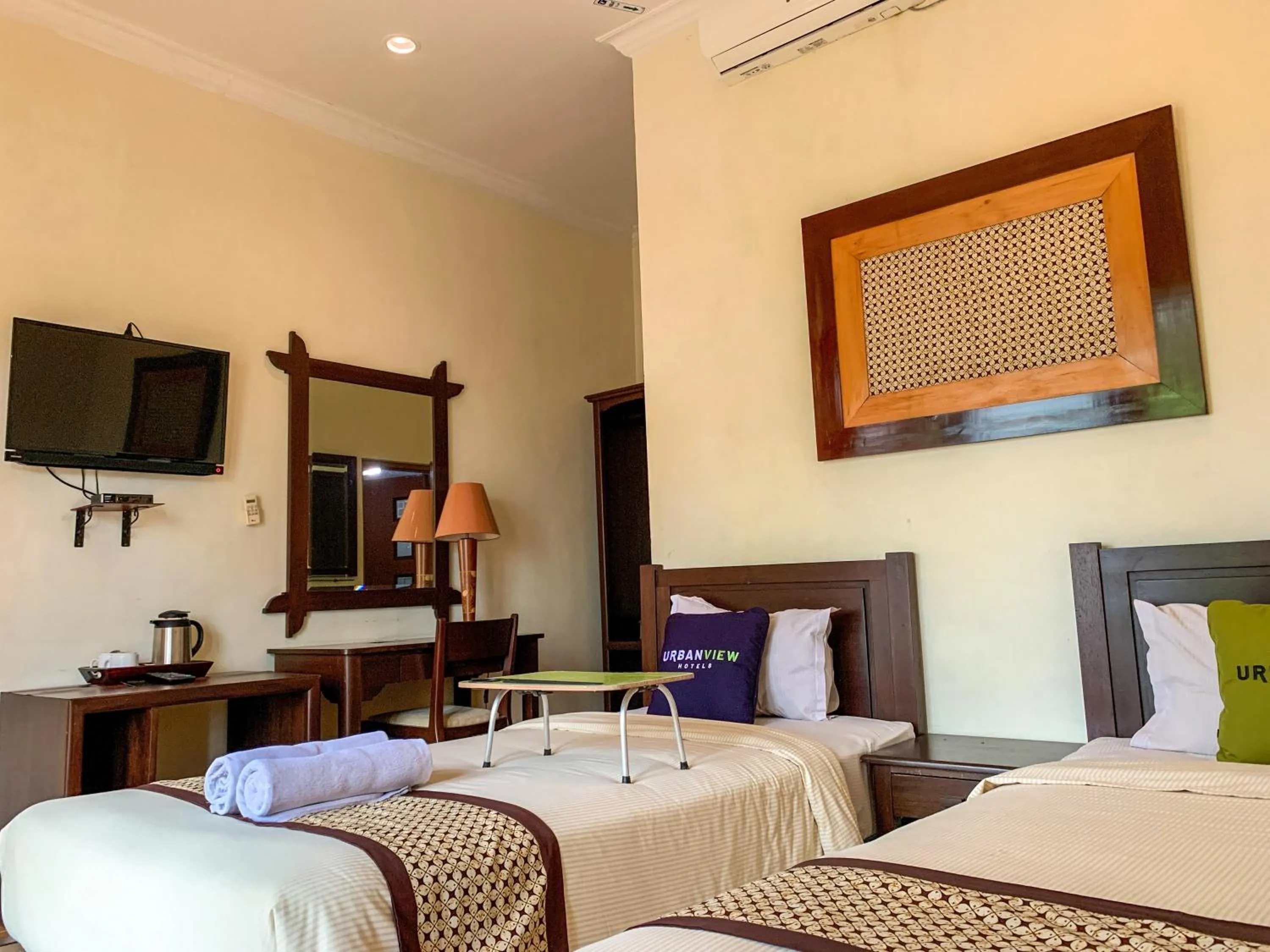 Bed in Urbanview Sasono Putro Condoongcatur by RedDoorz